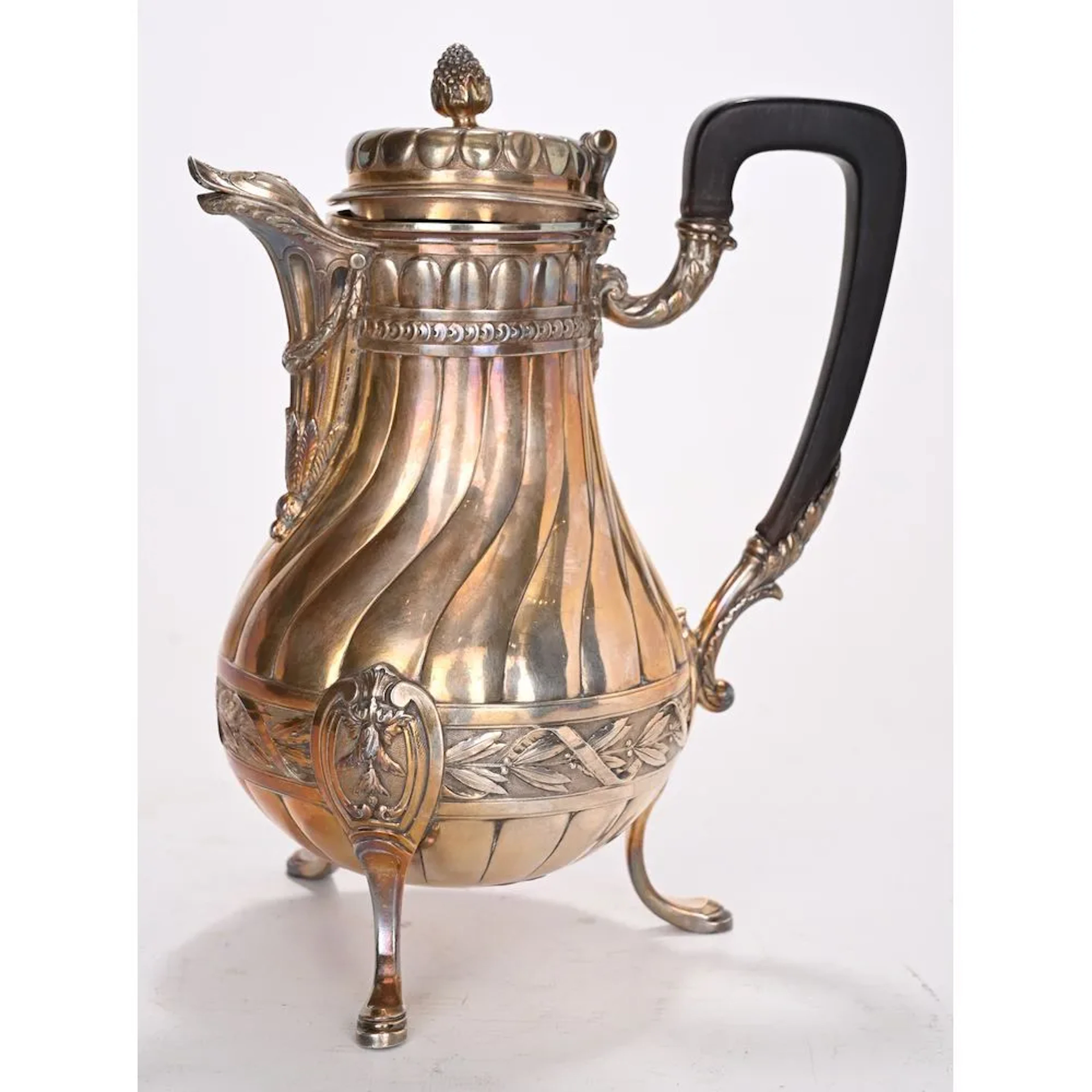Solid silver pitcher hallmarked with Minerva, decorated with laurel