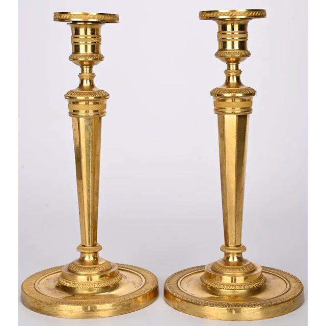 A BEAUTIFUL PAIR OF CONSULATE CANDLESTICKS based on a design by GALLE