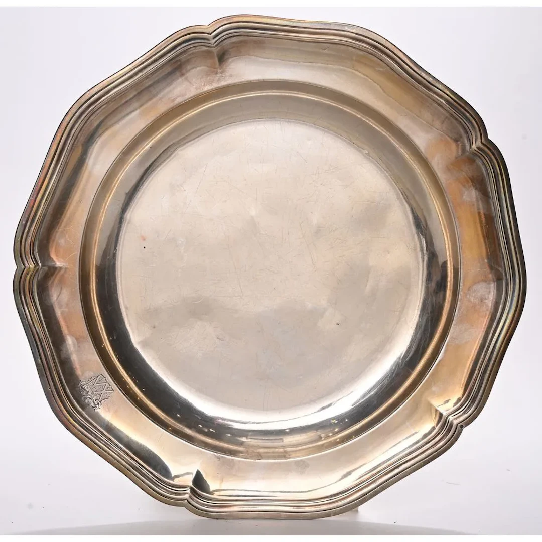 ODIOT, Paris. A scalloped-edge dish made of solid silver, hallmarked