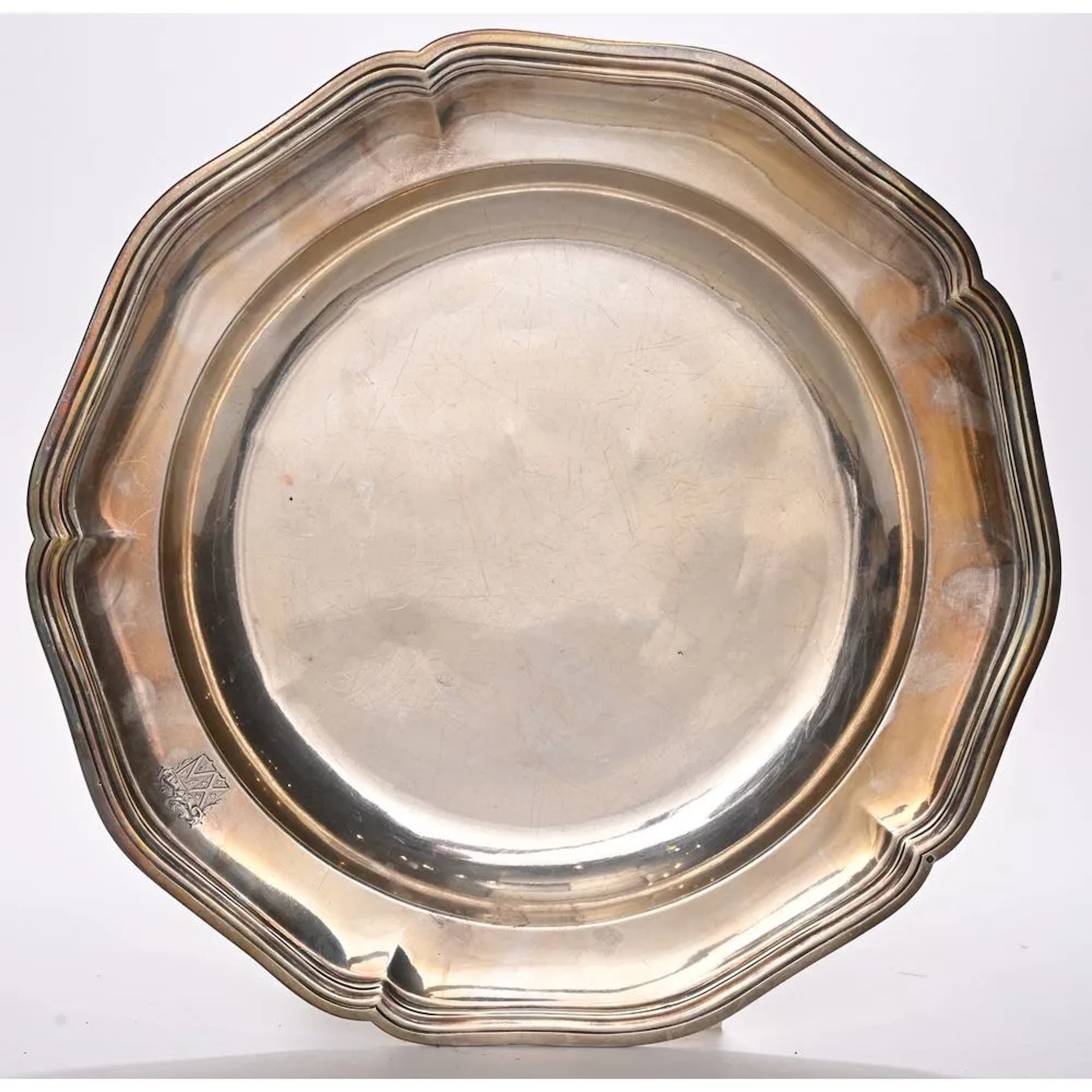 ODIOT, Paris. A scalloped-edge dish made of solid silver, hallmarked