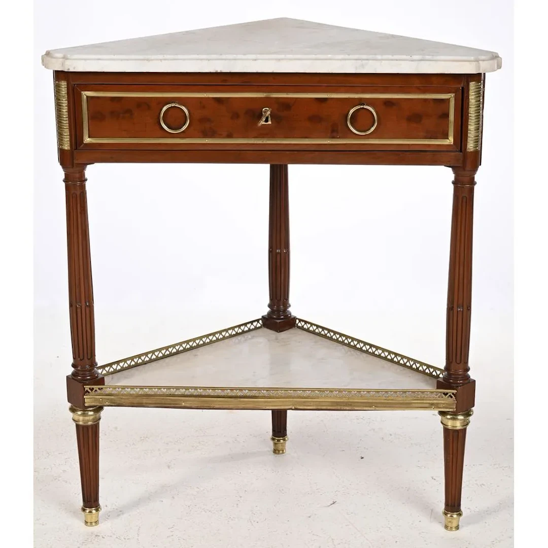 LOUIS XVI CORNER CABINET in lightly mottled mahogany with molding