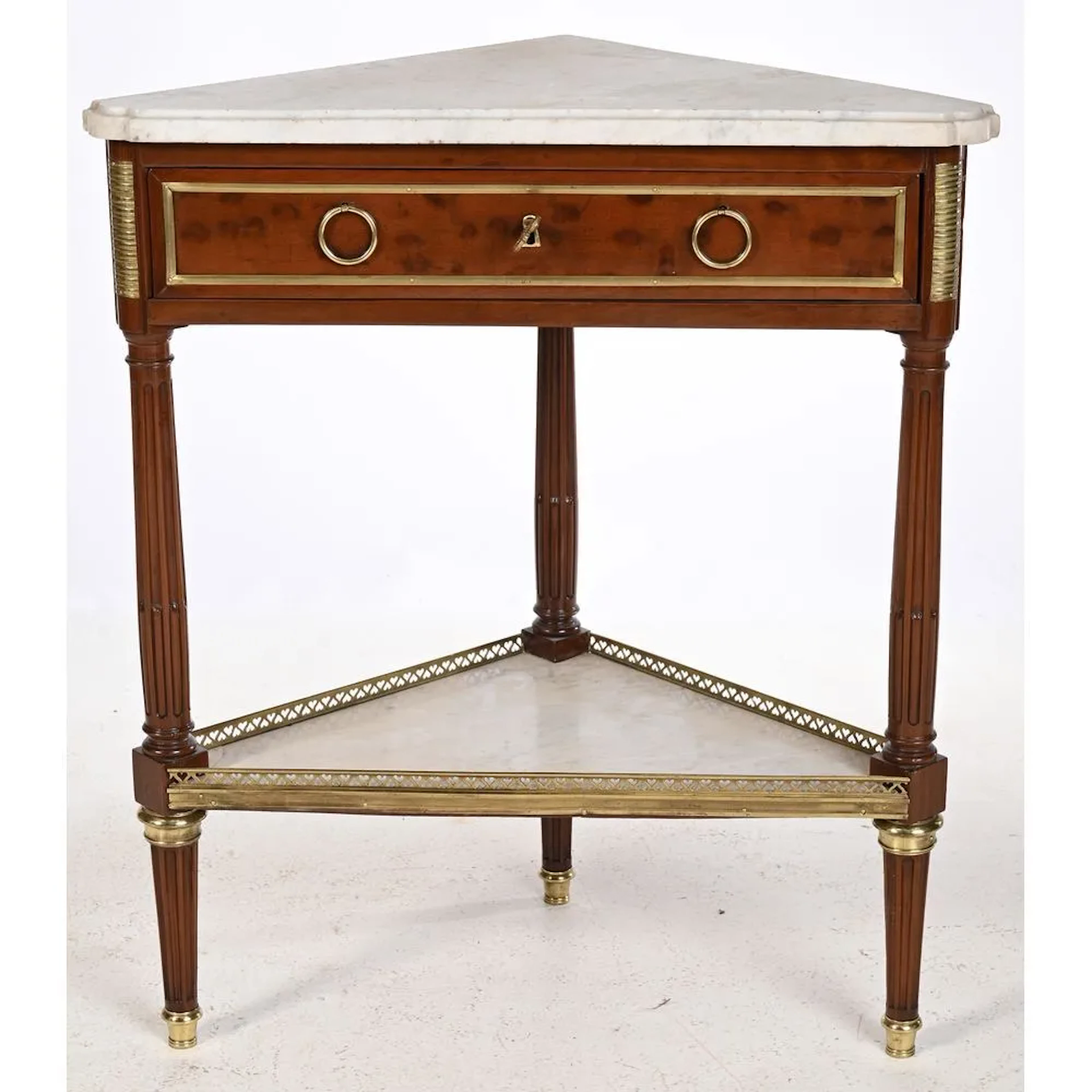 LOUIS XVI CORNER CABINET in lightly mottled mahogany with molding