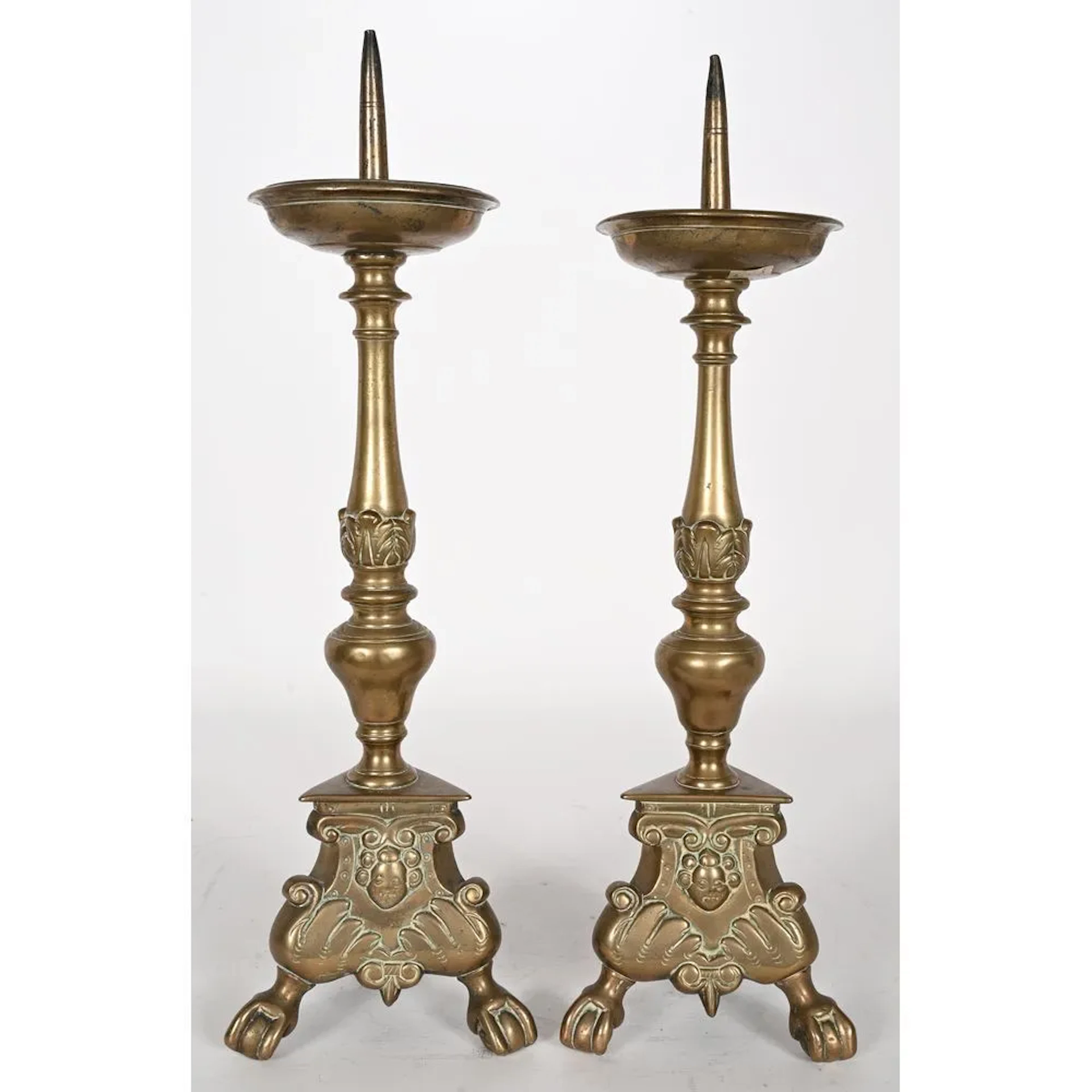 LARGE PAIR OF LOUIS XIII CANDLESTICKS in patinated bronze with a tripod