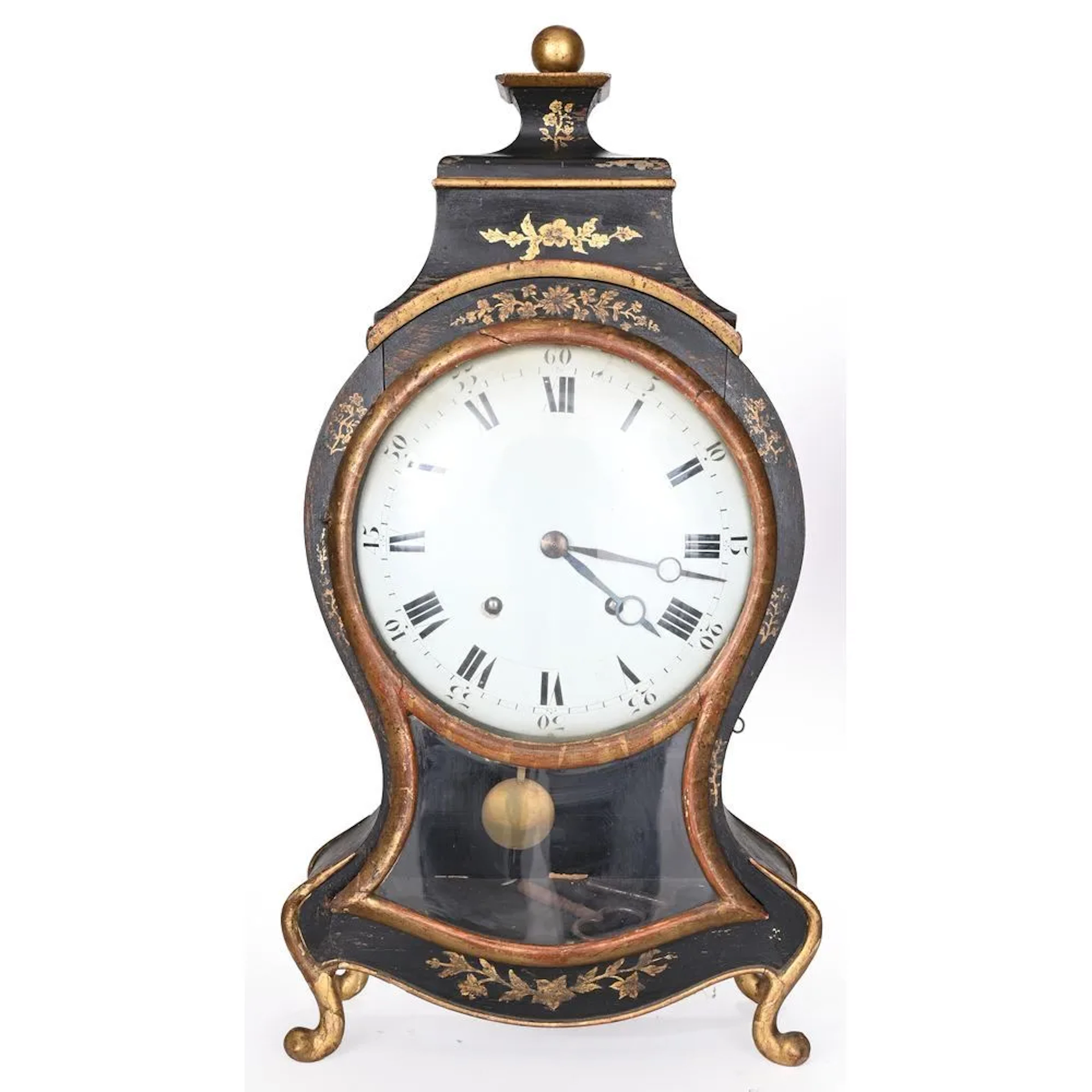 A clock from Neufchâtel, made of wood with a black and gold finish
