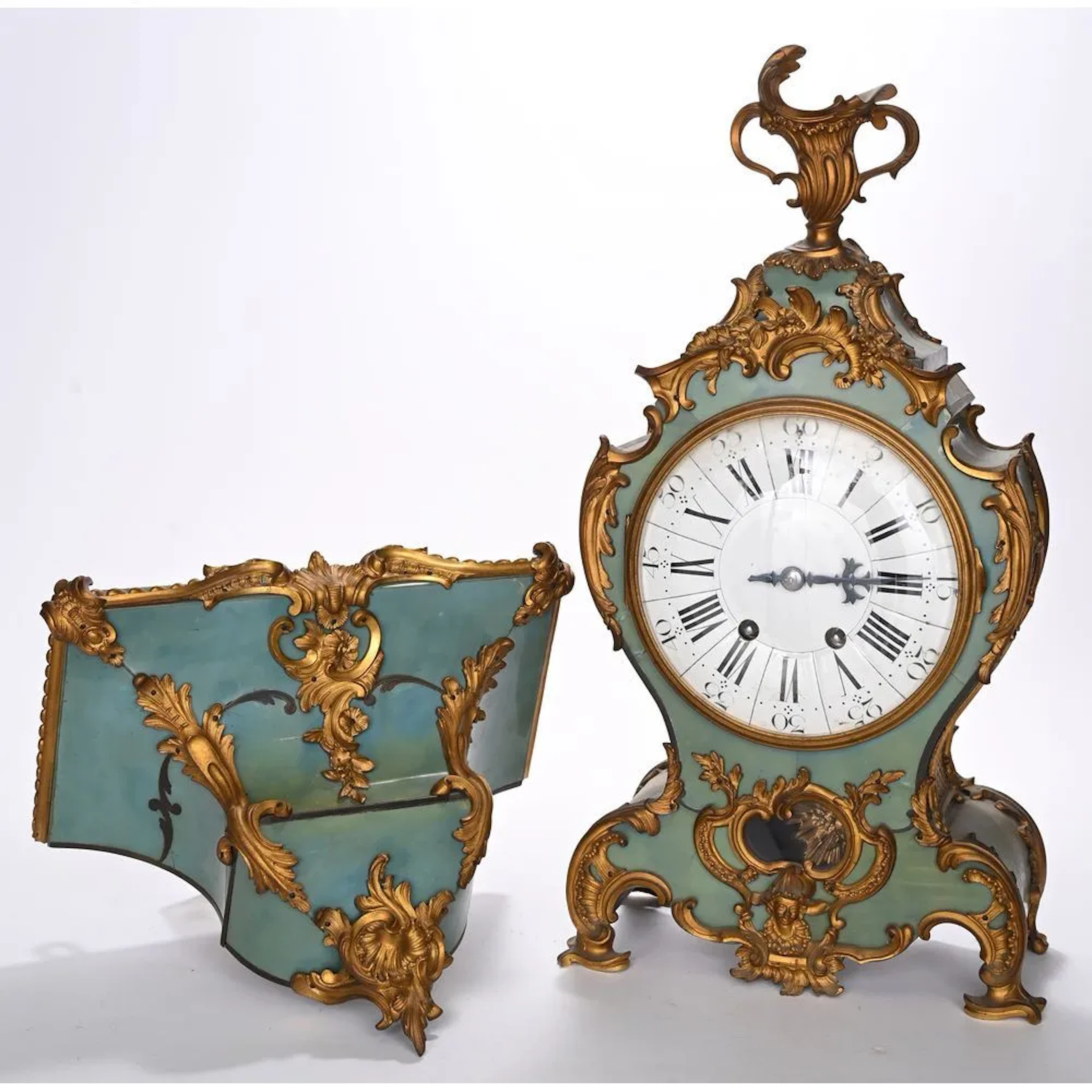 LOUIS XV ALCOVE CLOCK made of green horn and gilded bronze, with a