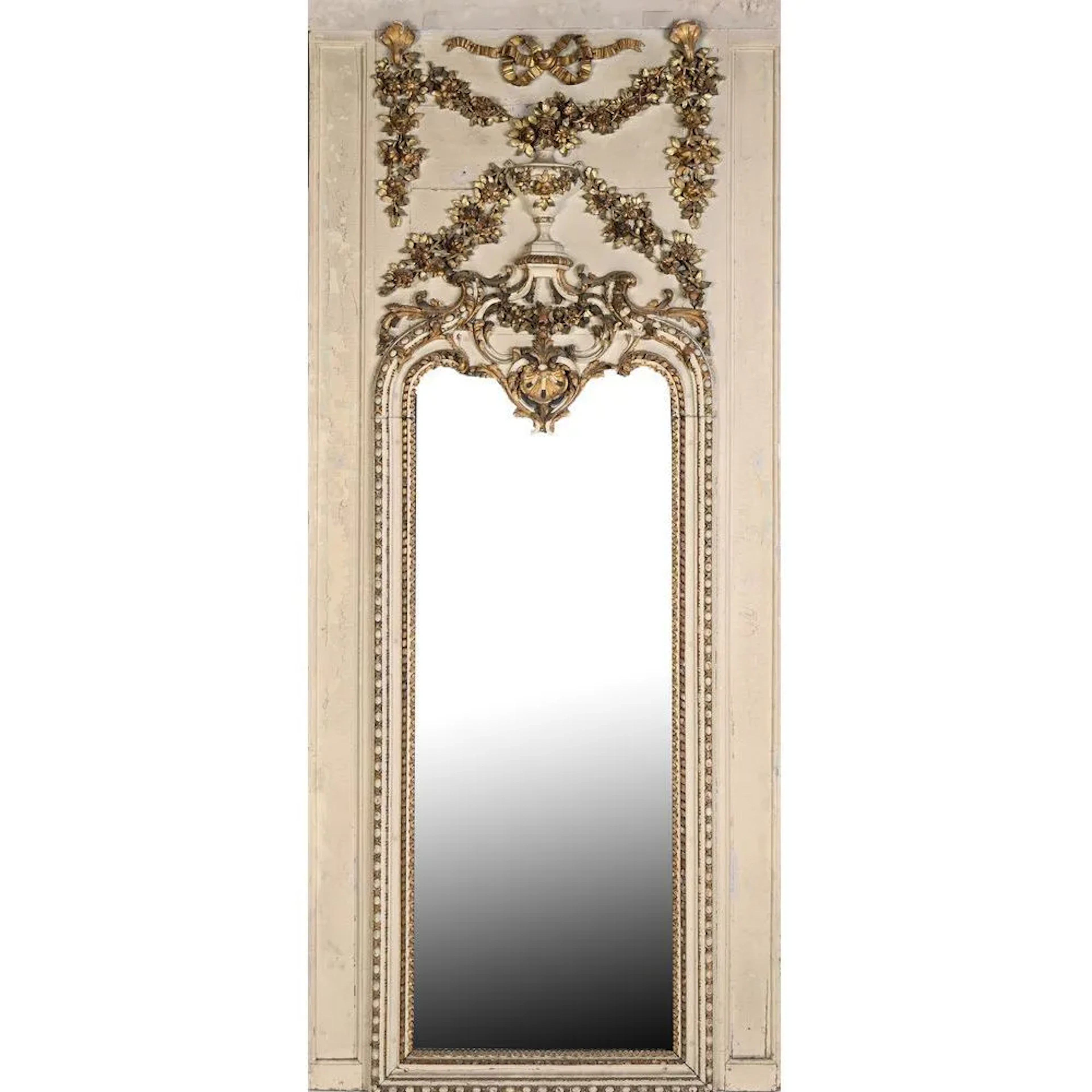 LARGE LOUIS XVI TRUMEAU made of repainted and gilded wood, featuring