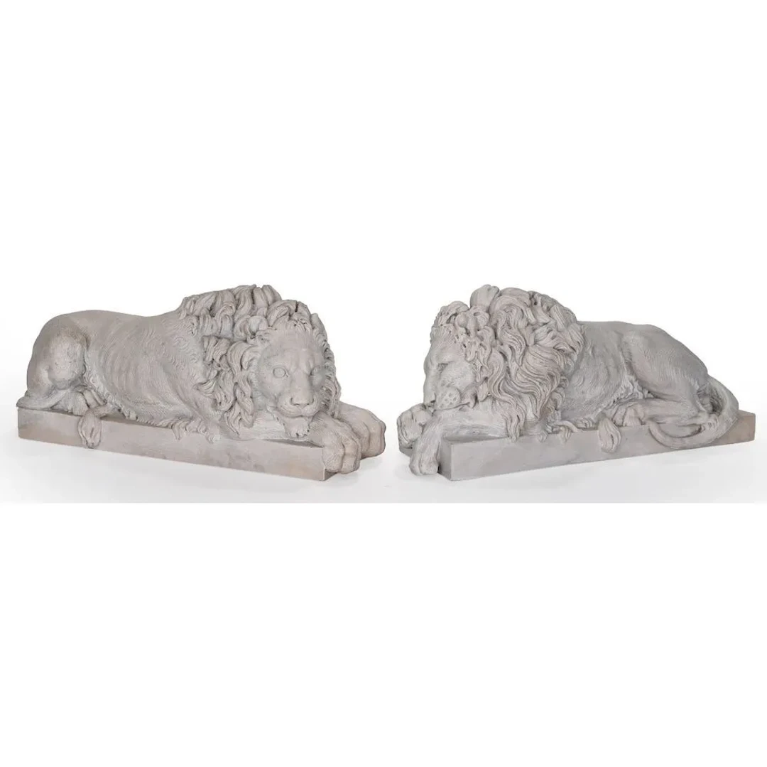 CANOVA (after). PAIR OF RECLINING LIONS in white marble. They rest