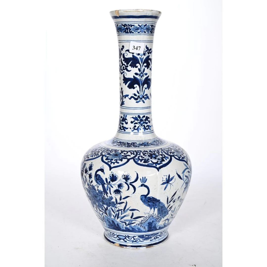 DELFT. Ceramic vase decorated in shades of blue with insects among