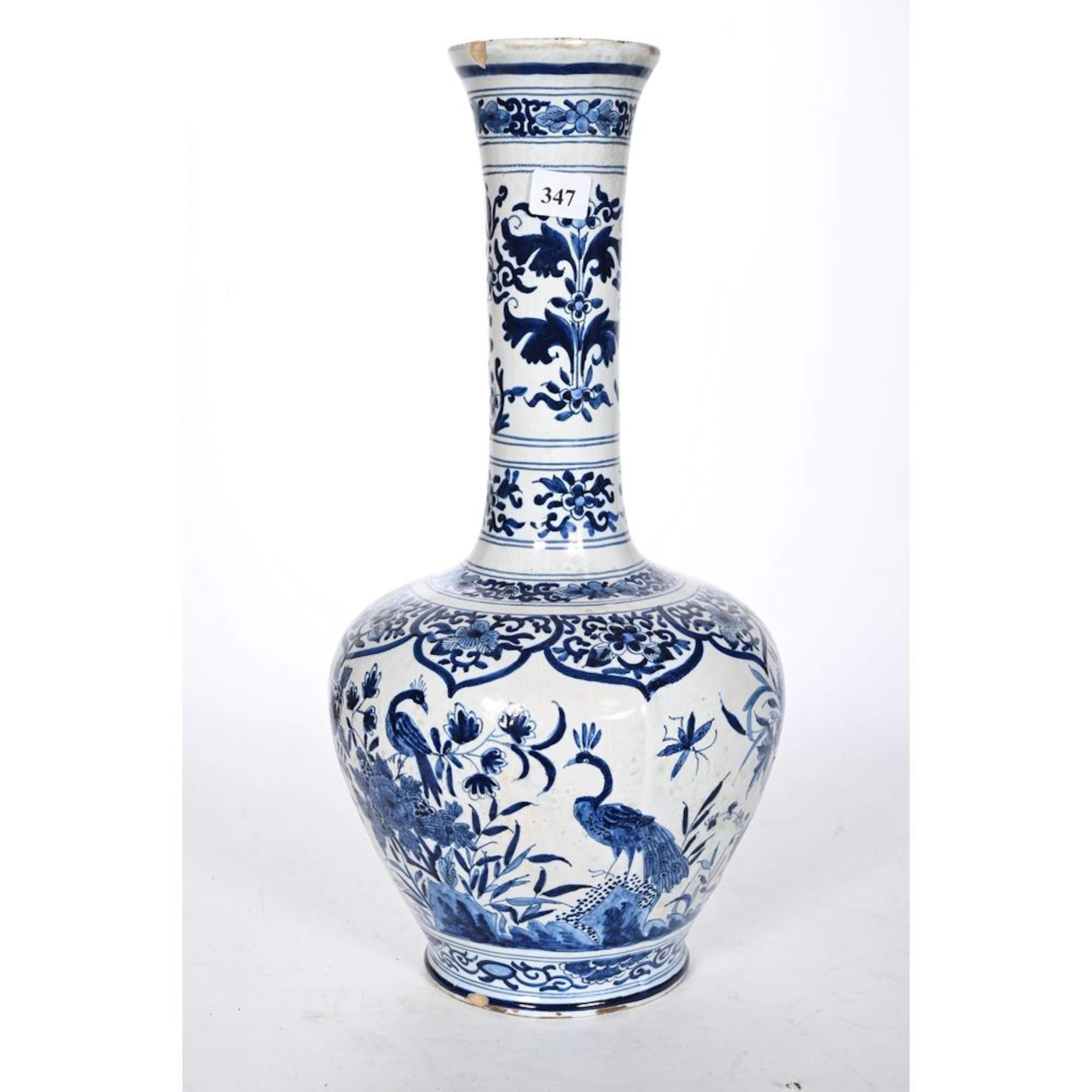 DELFT. Ceramic vase decorated in shades of blue with insects among