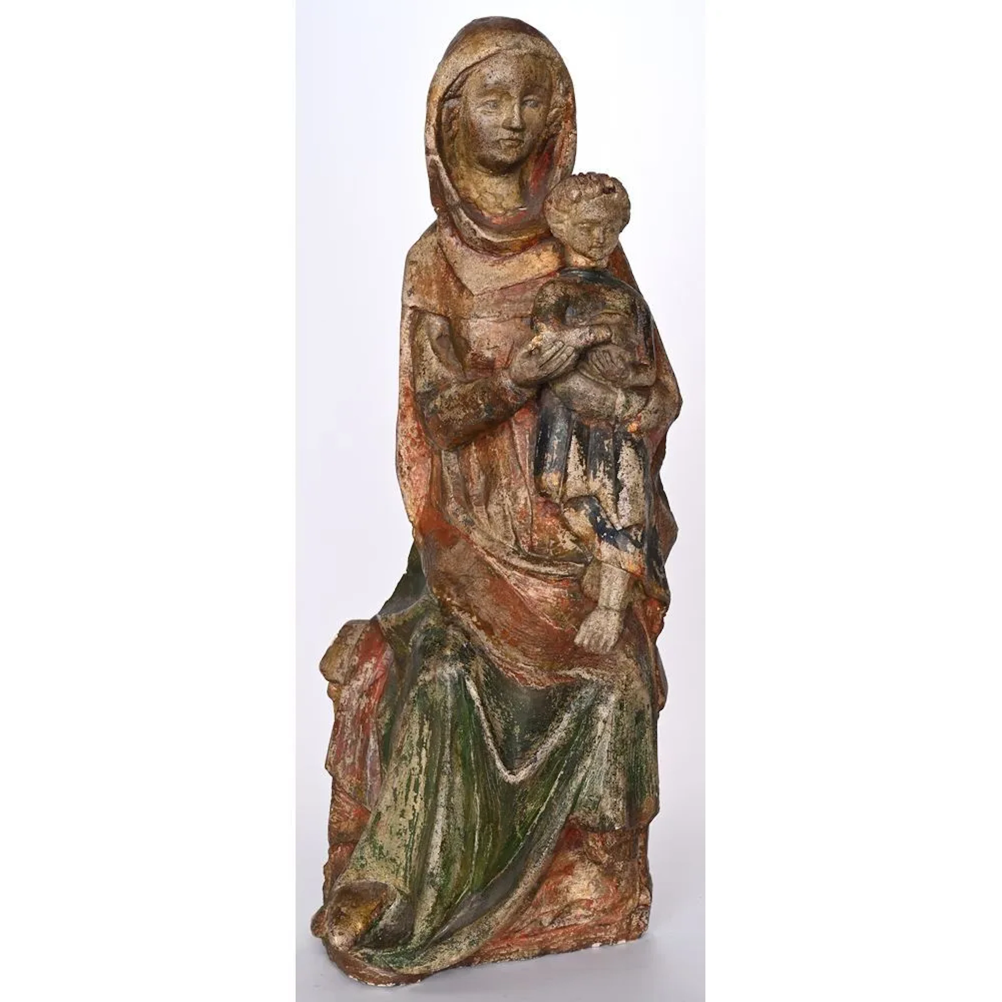 MADONNA AND CHILD IN THE MEDIEVAL STYLE, made of polychrome stone.