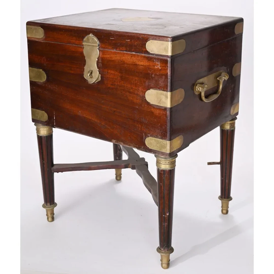 EMPIRE-STYLE TRAVEL TOILET CASE made of mahogany with brass inlays.