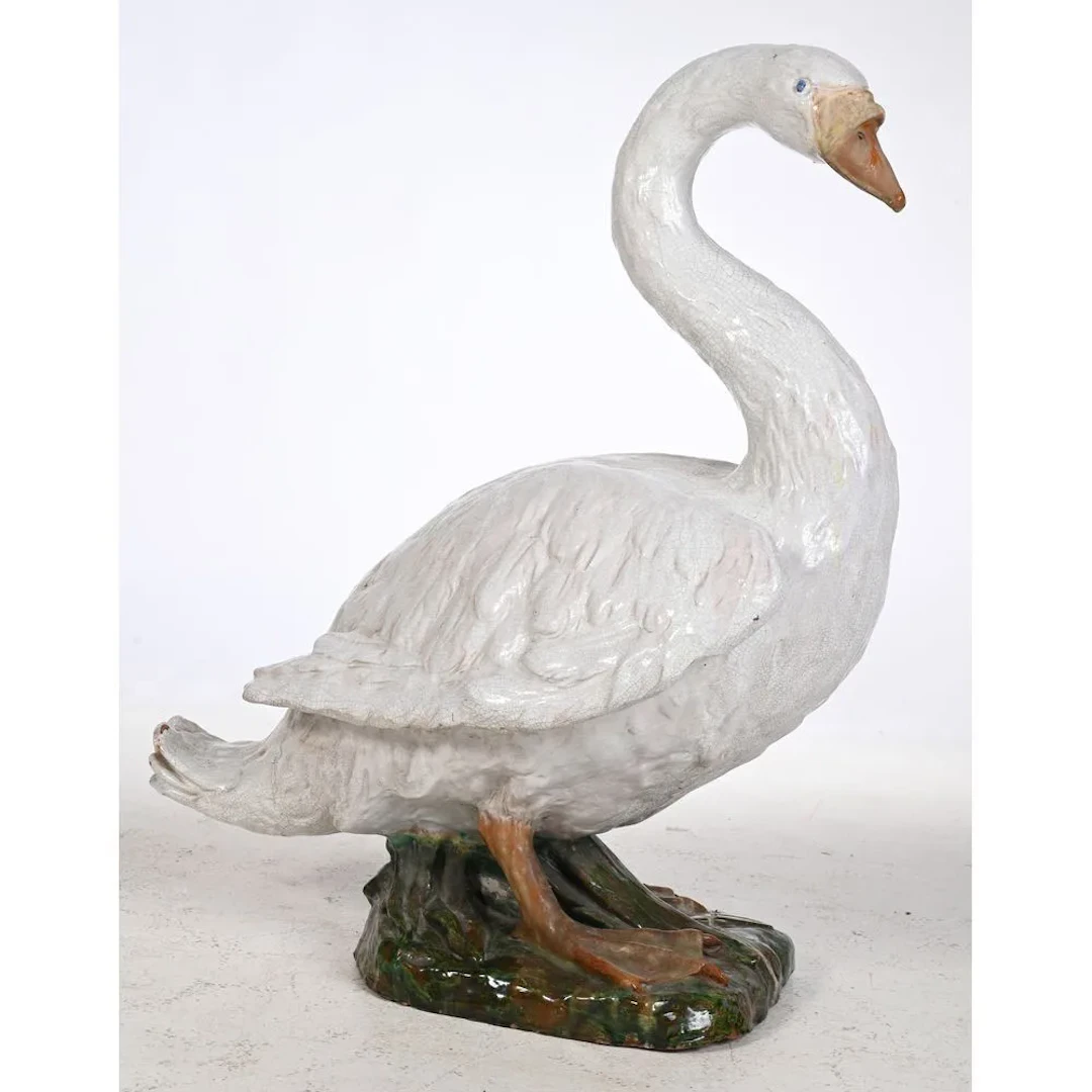 LARGE SCULPTURE in glazed terracotta depicting a standing swan. (Minor