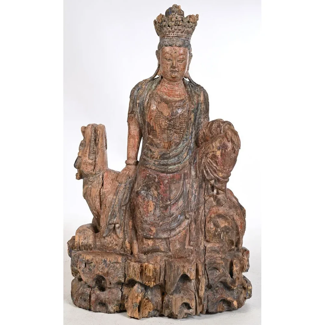 Guanyin in the Royal Relaxation Pose; wood with significant remnants