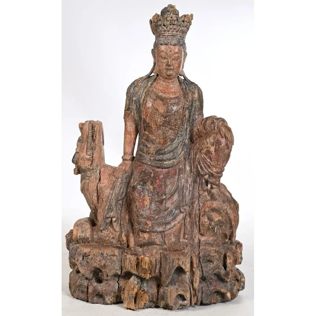 Guanyin in the Royal Relaxation Pose; wood with significant remnants