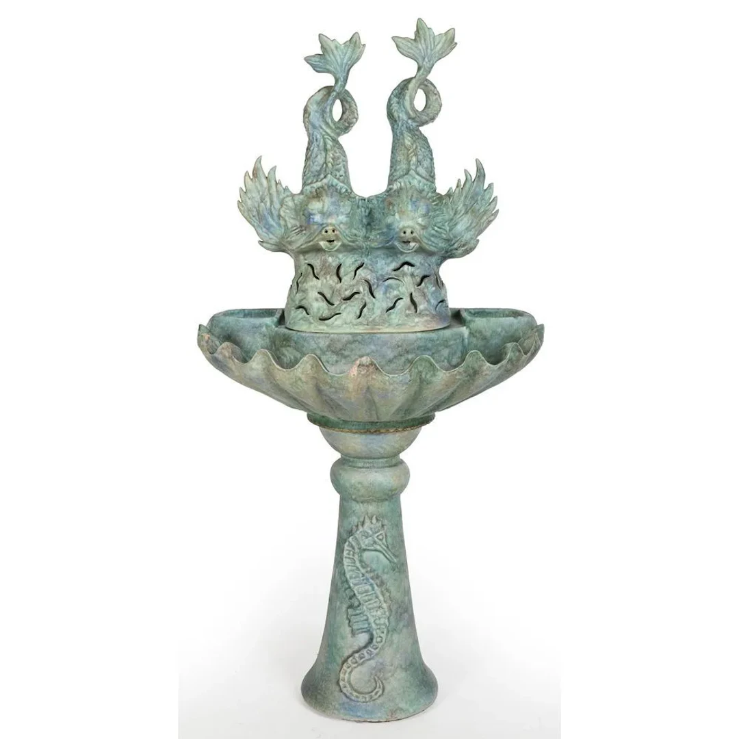 VALLAURIS. Glazed ceramic fountain with dolphins. The rounded base