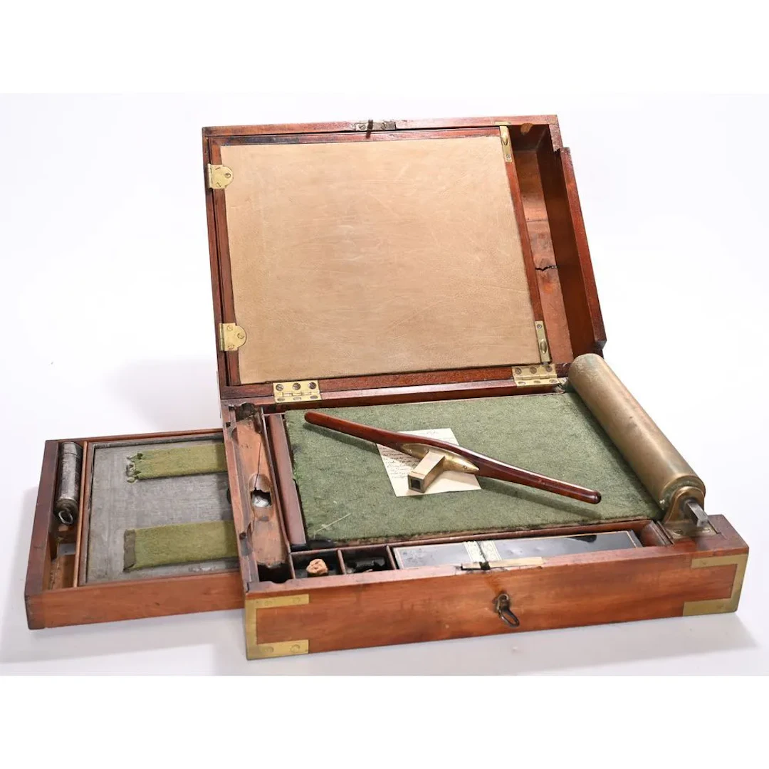 RARE CASE containing a portable mahogany printing press with brass