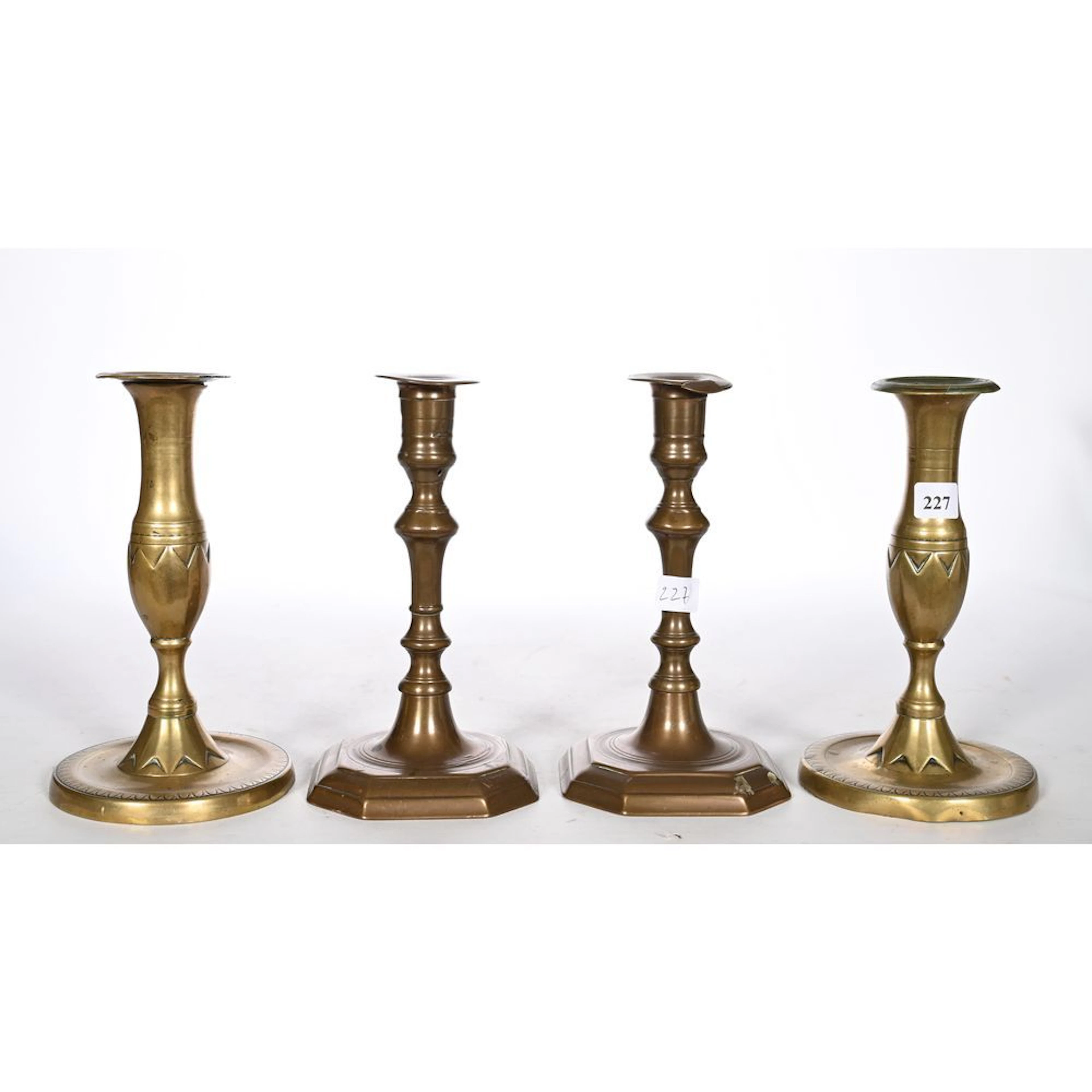 2 PAIRS OF CANDLESTICKS in gilded bronze. Antique. H. 19.