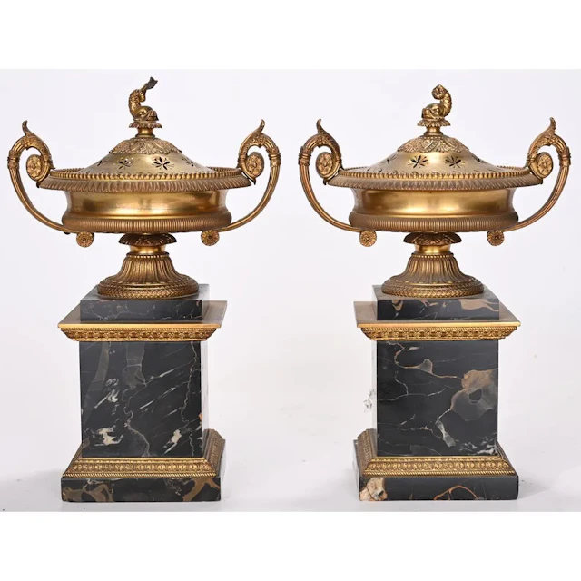 PAIR OF EMPIRE-STYLE INCENSE BURNERS in gilded bronze and black Portor