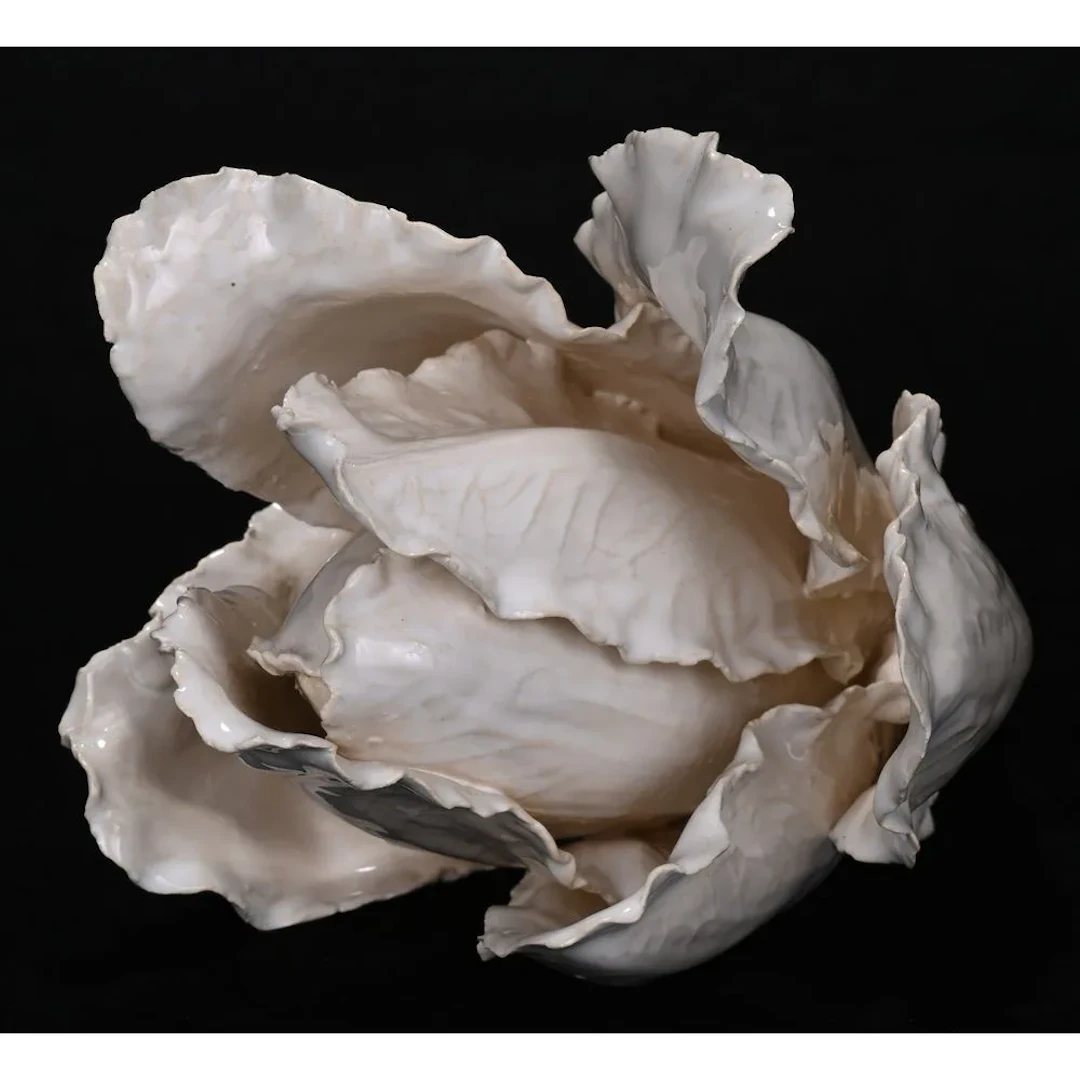 GOURDON, Jean-Paul. (1956). “An Endive.” Original terracotta. Signed