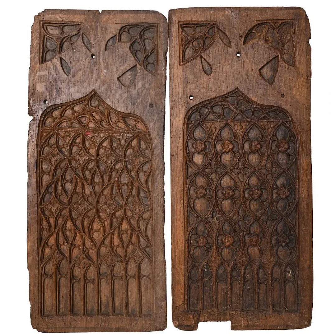 PAIR OF GOTHIC-STYLE PANELS in weathered oak, featuring window motifs