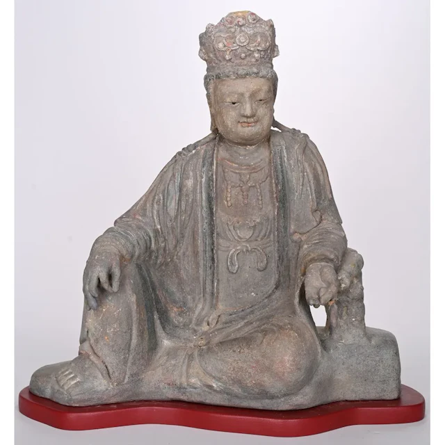 AVALOKITESVARA BODHISATTVA in a royal reclining posture. Terracotta