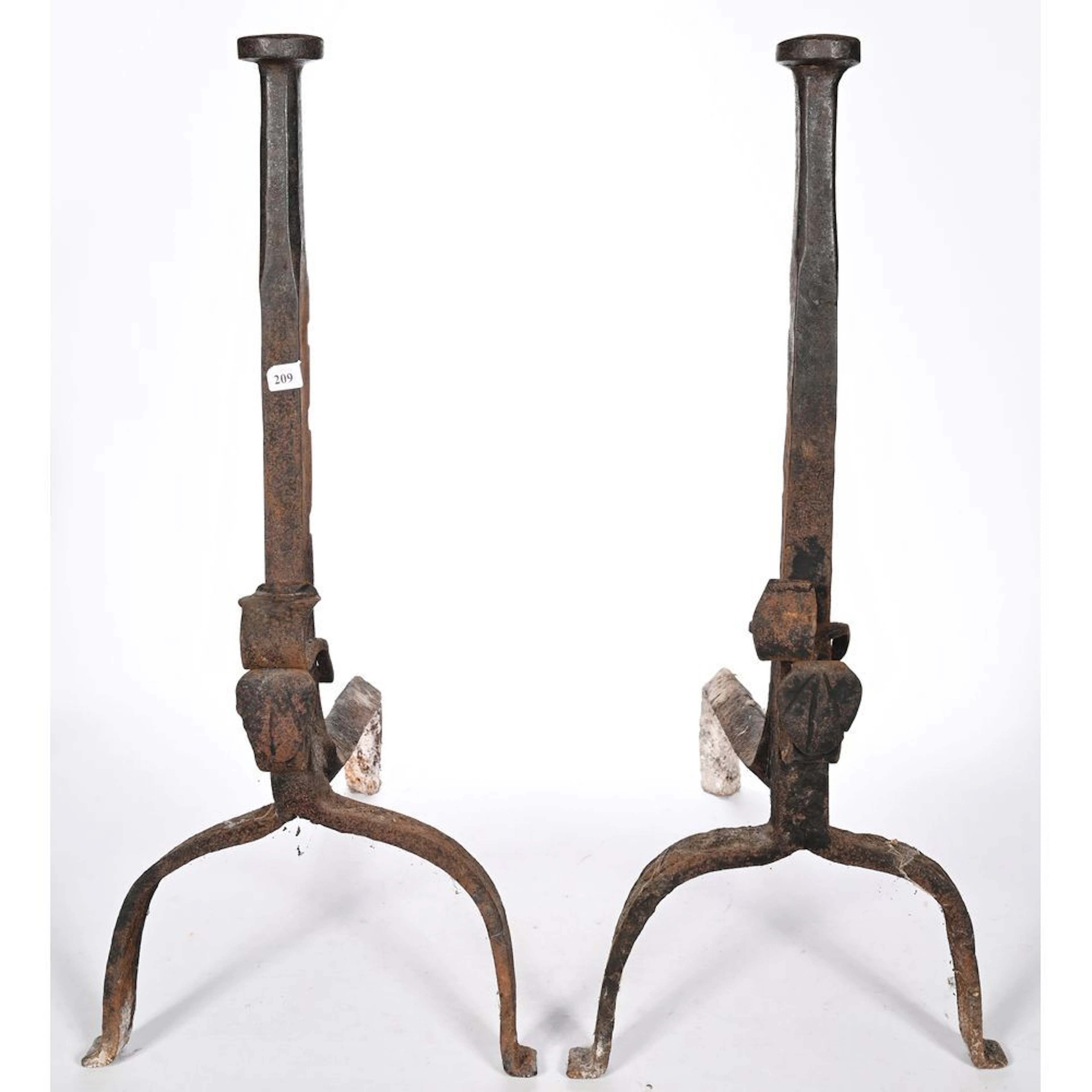 PAIR OF CAST-IRON LANDIERS with arched bases. Baluster shafts. (Antique