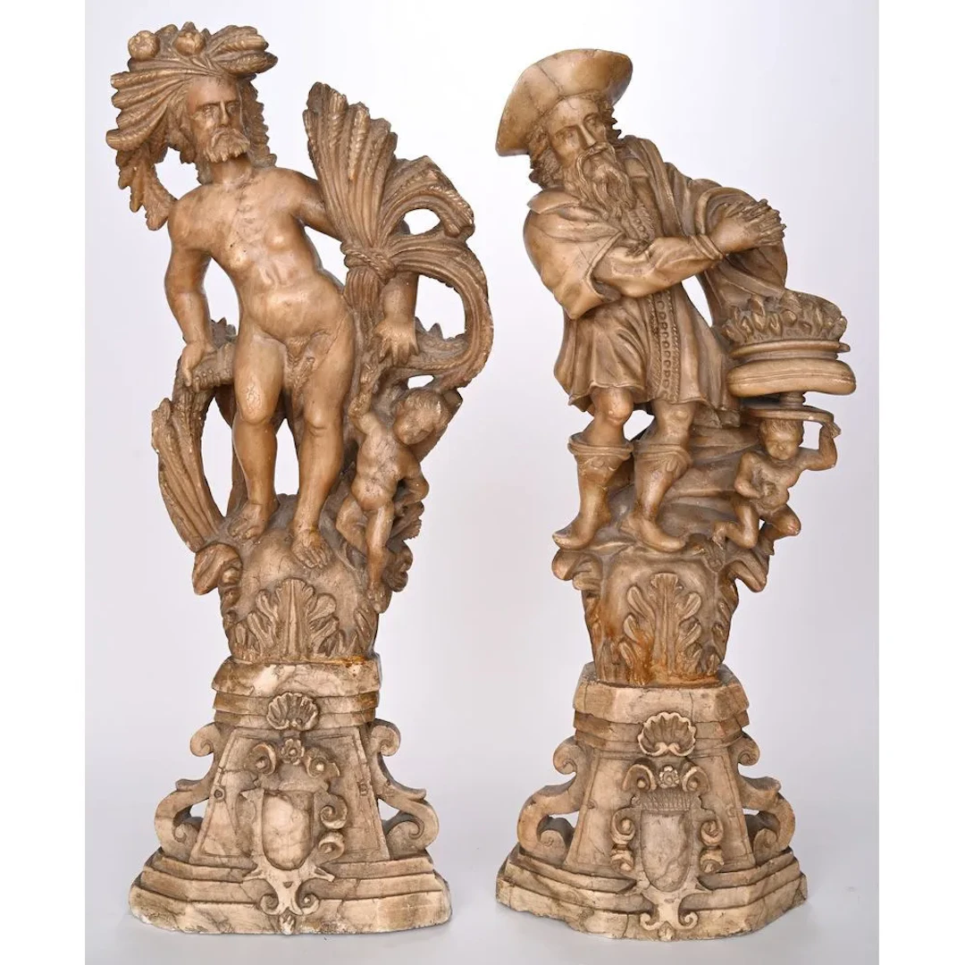 PAIR OF LARGE ALBASTRE SCULPTURES depicting summer and winter, illustrated
