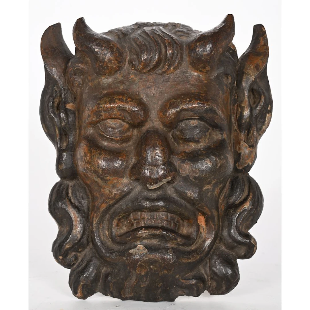 SATYR MASK, a relief wall sconce made of weathered wood. 19th-century