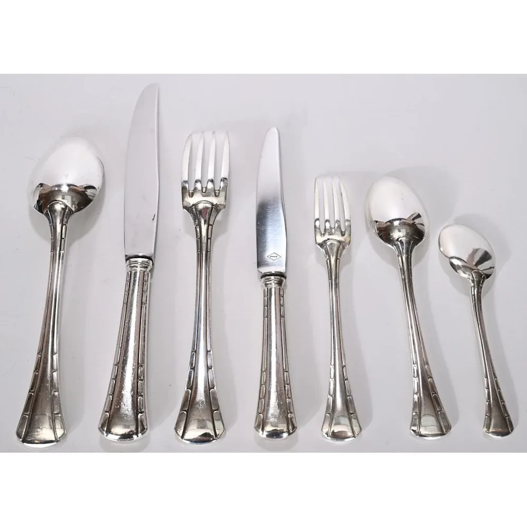 RAVINET DENFERT. A 91-piece Art Deco-era silver plated cutlery set