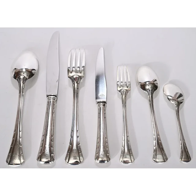 RAVINET DENFERT. A 91-piece Art Deco-era silver plated cutlery set