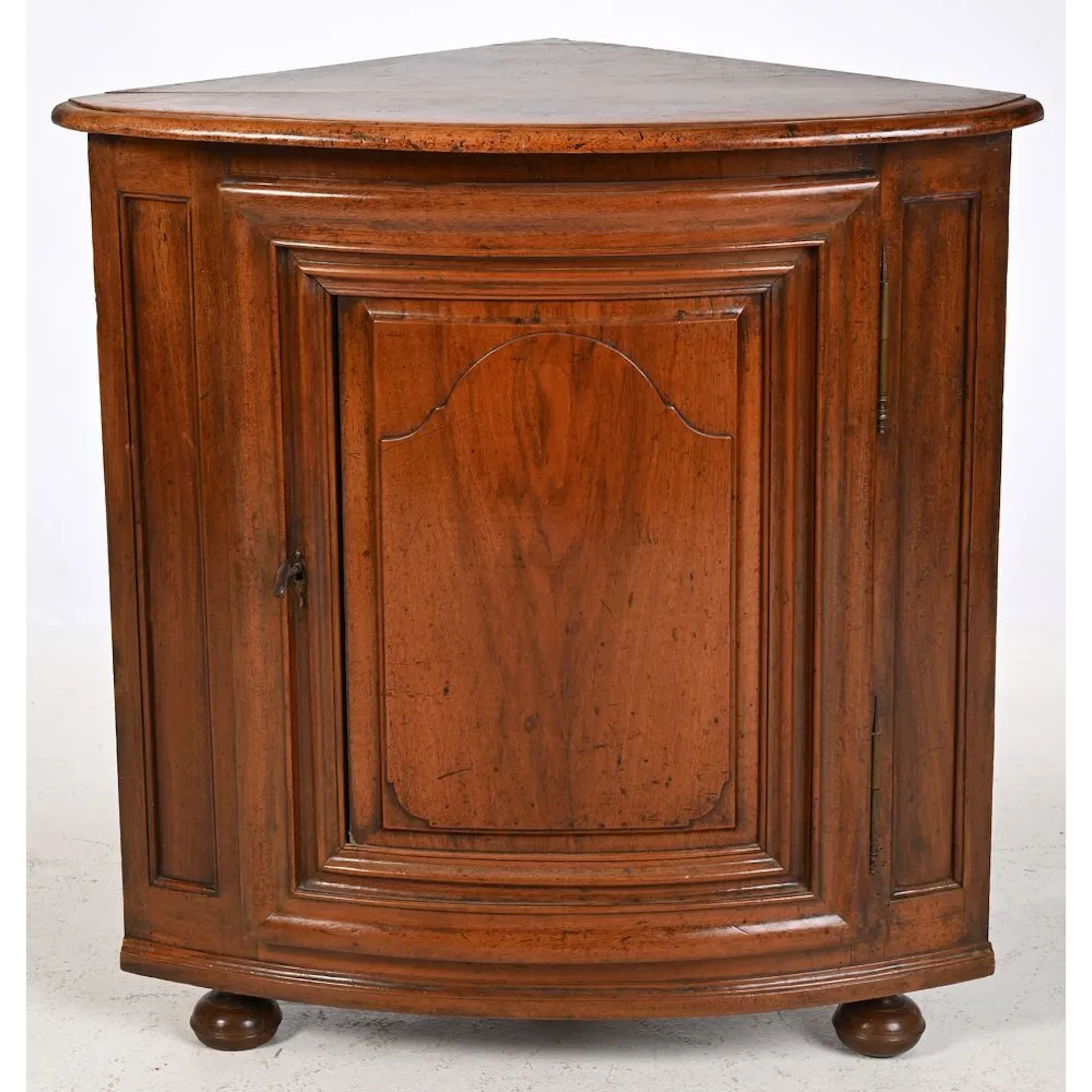 LOUIS XIV CORNER CABINET in solid walnut with a single rounded door