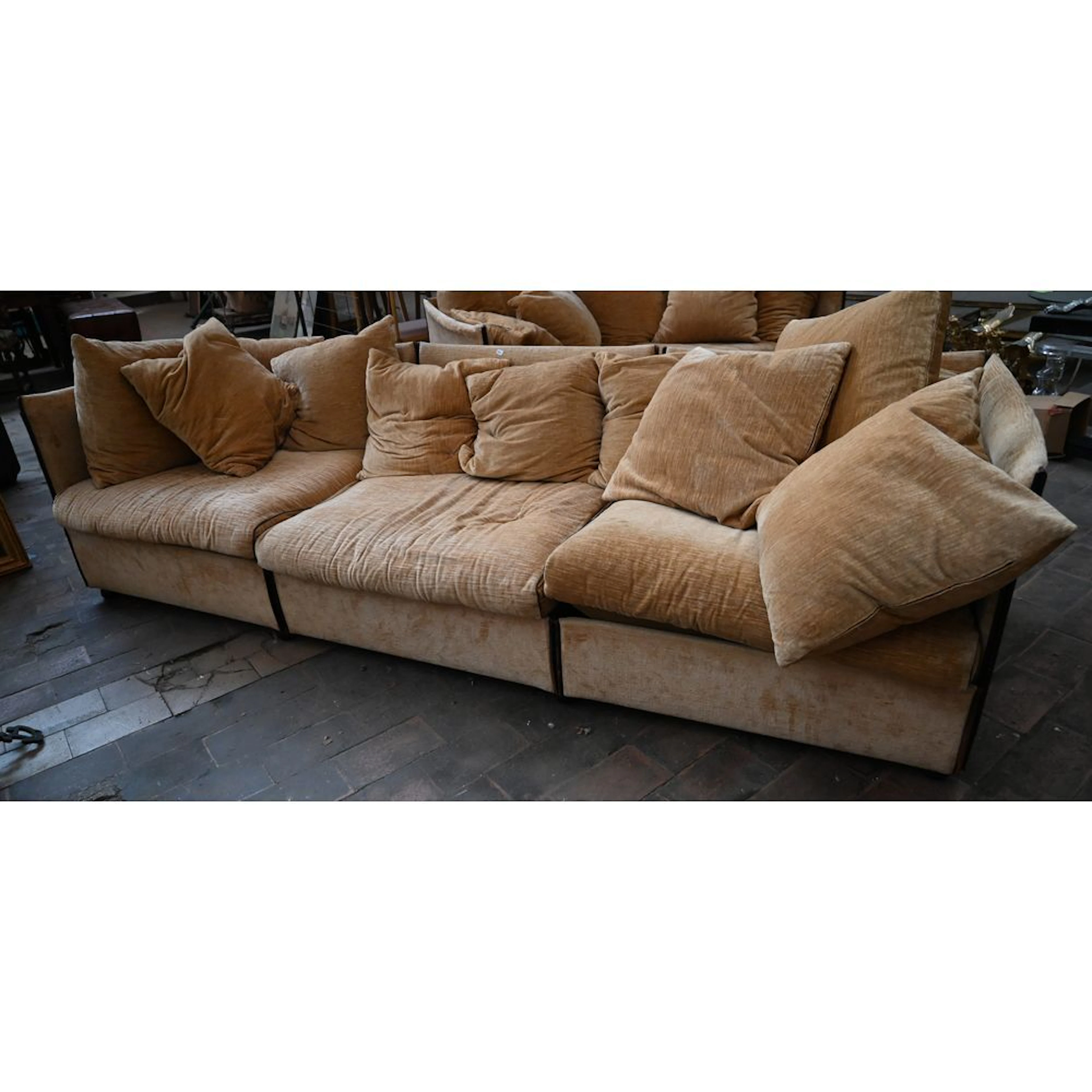 MARIO BELLINI for CASSINA. LARGE SOFA in fabric with leather-covered