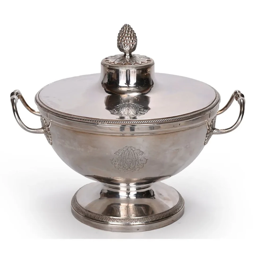 Round 18th-century solid silver soup tureen resting on a pedestal