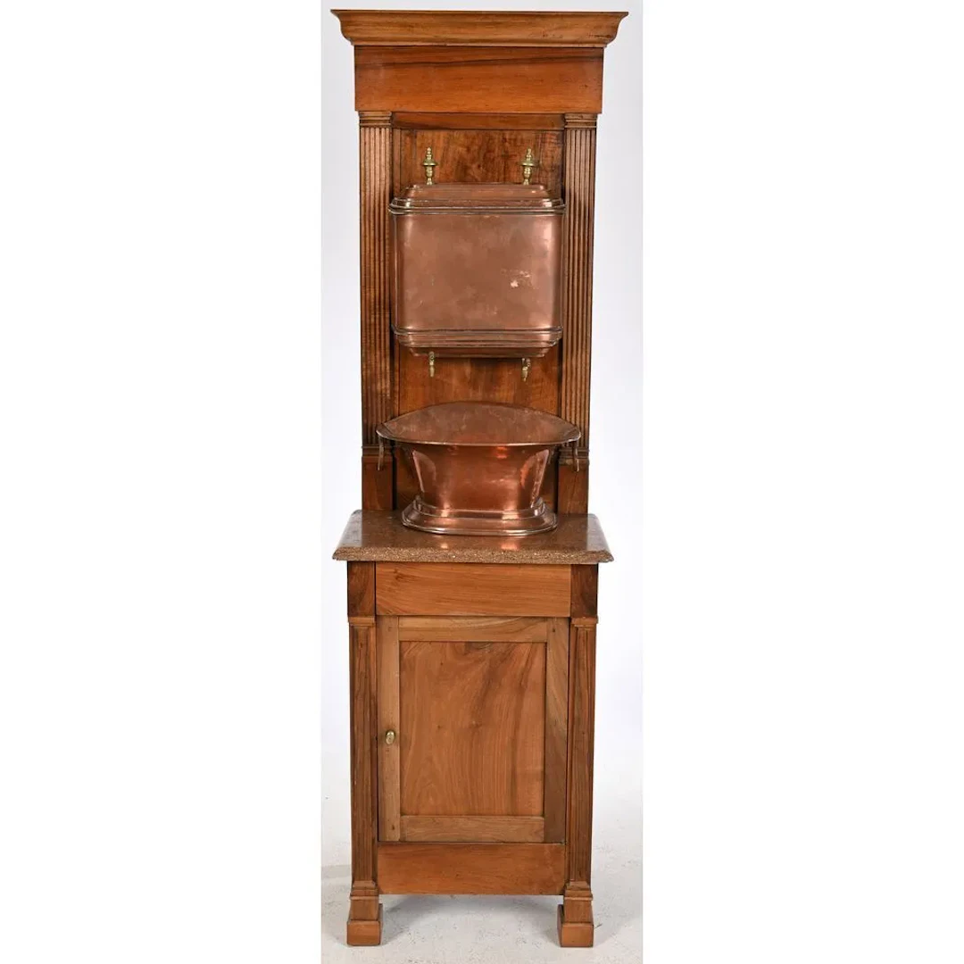 Copper FOUNTAIN with its basin, mounted on a walnut display stand.
