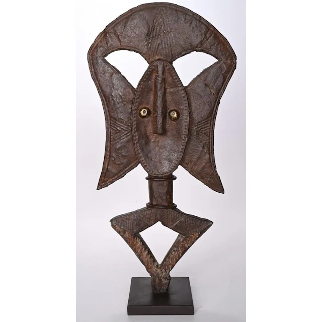 LARGE AND RARE RELIC FIGURE made of wood and iron. Eyes made of brass