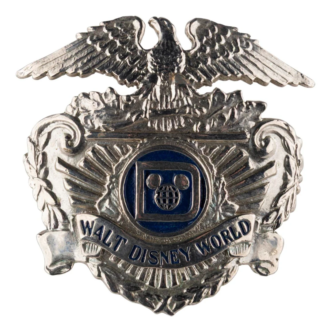 A 1970s Walt Disney World Security Hat Badge.