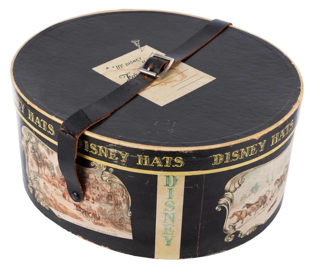 A "Disney" Hatbox with Leather Strap.