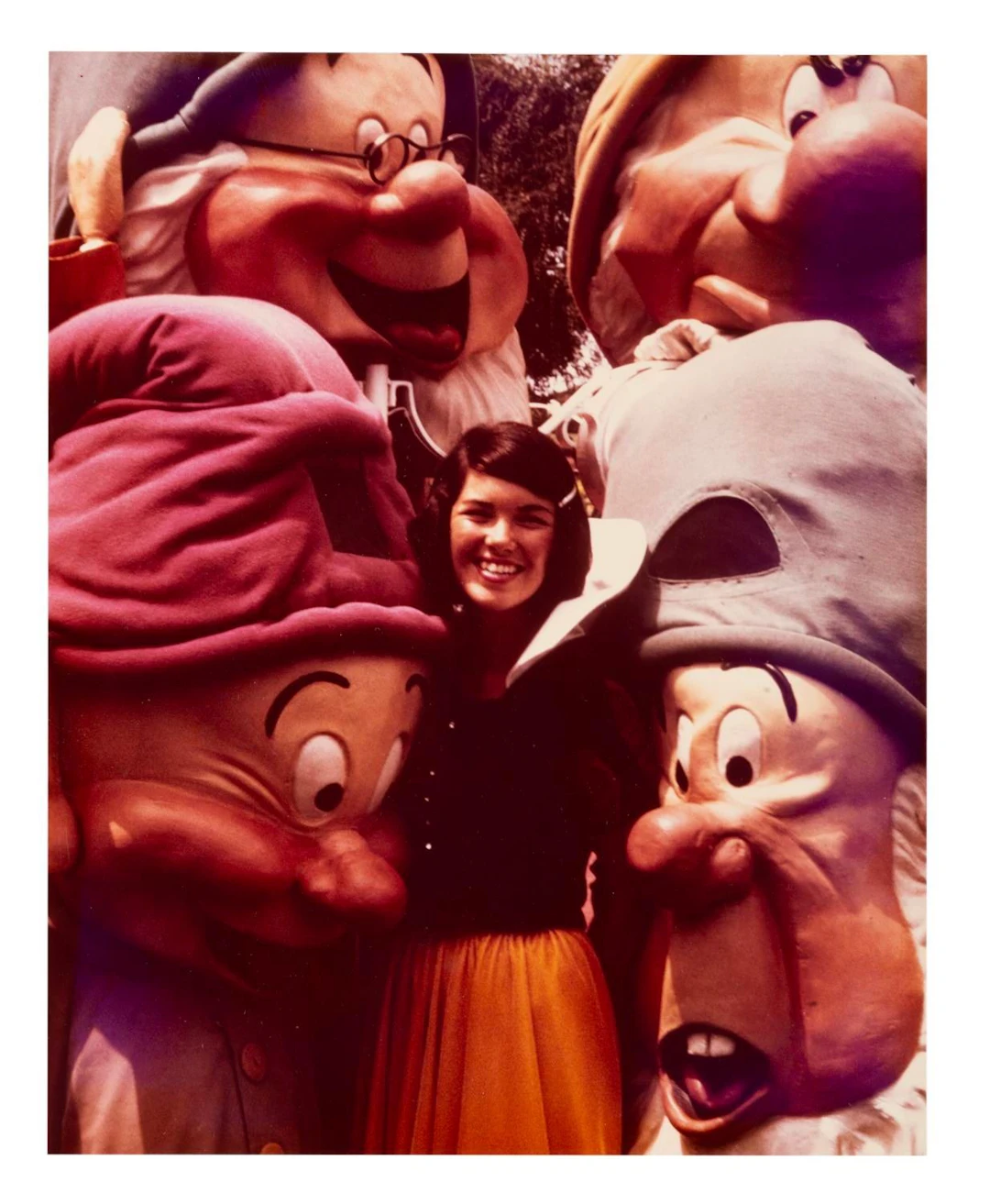 A Walk-Around Character Photograph of Snow White & Dwarfs.