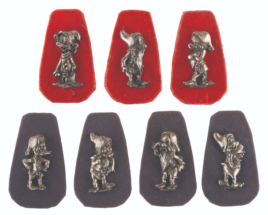 A Set of "Snow White and the Seven Dwarfs" Figurines on Plaques.