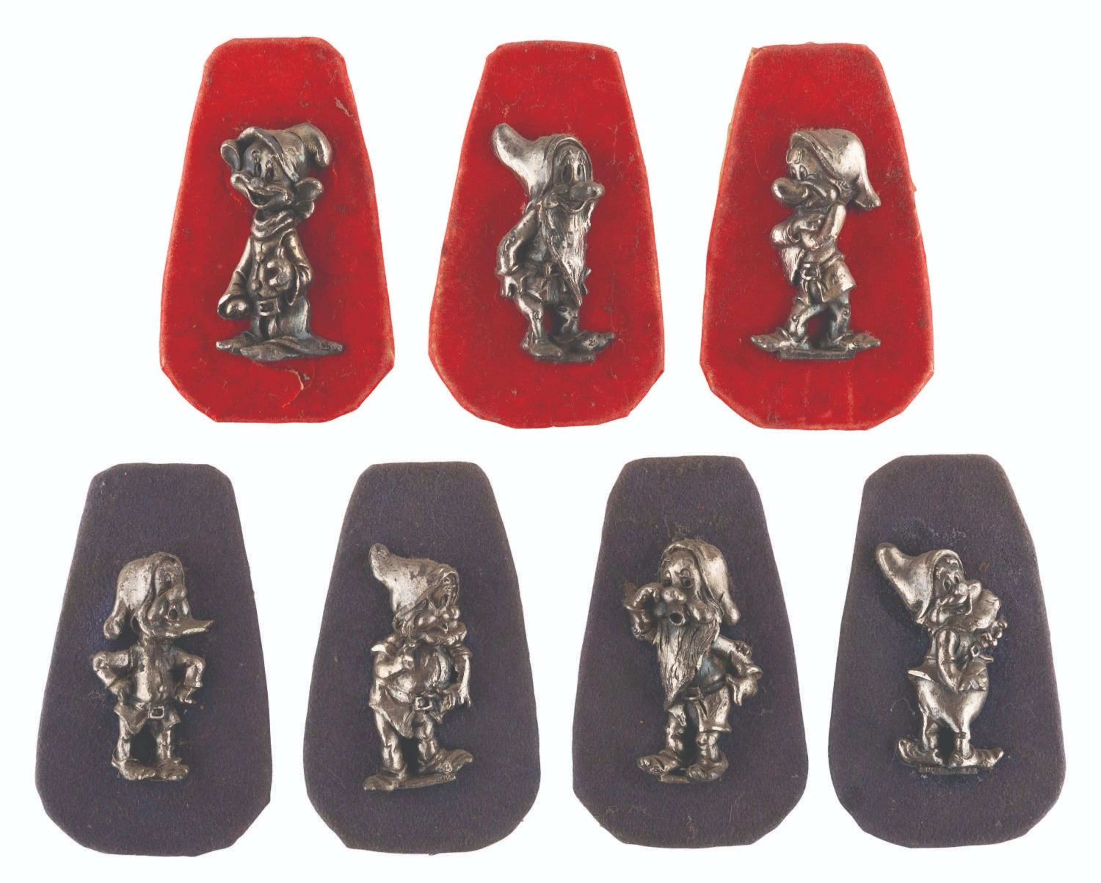 A Set of "Snow White and the Seven Dwarfs" Figurines on Plaques.