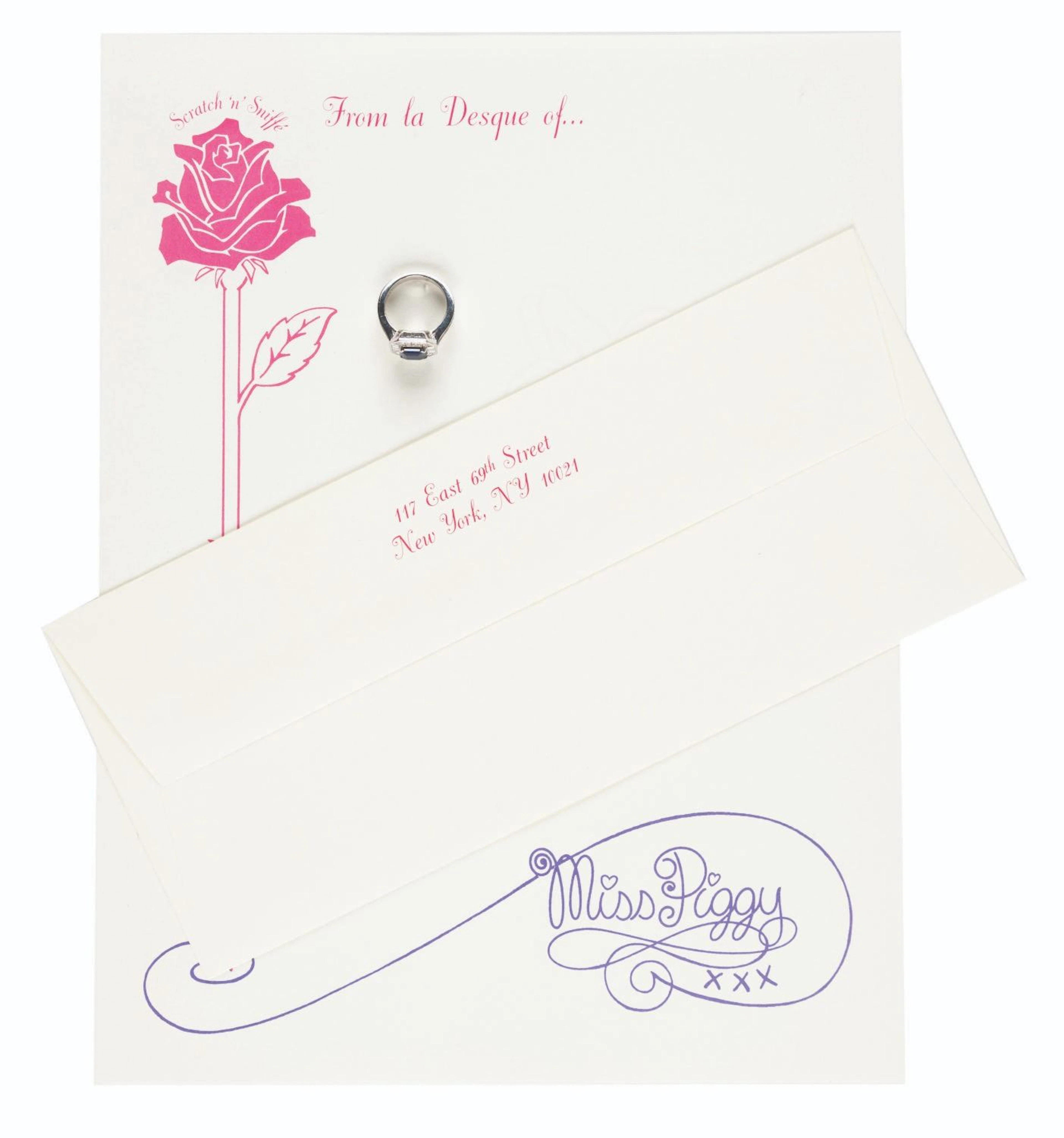 A Miss Piggy Prop Ring and Themed Studio Stationery.