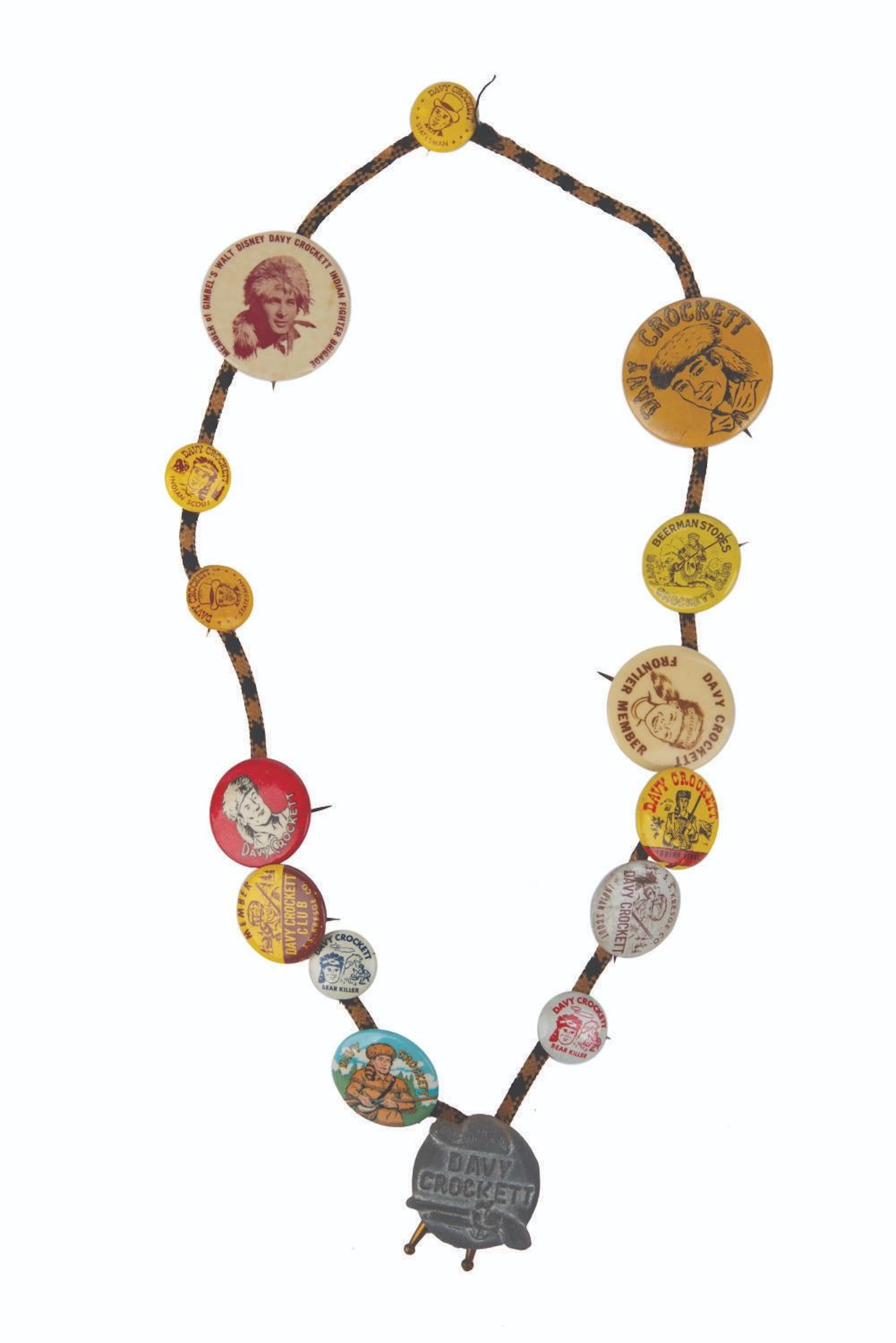 A Davy Crockett Bolo Tie with Pin Collection.