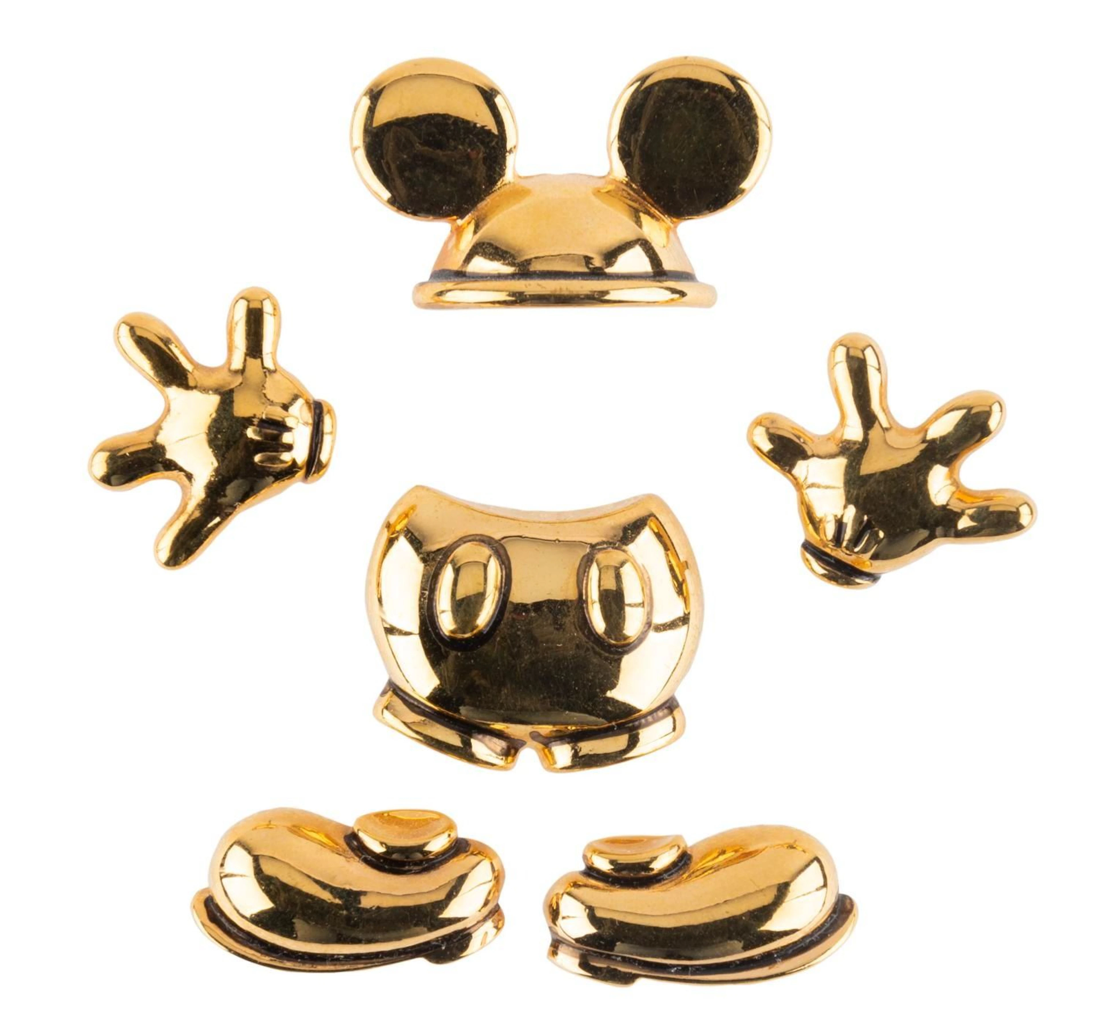 A Set of Disassembled Mickey Mouse Pins.