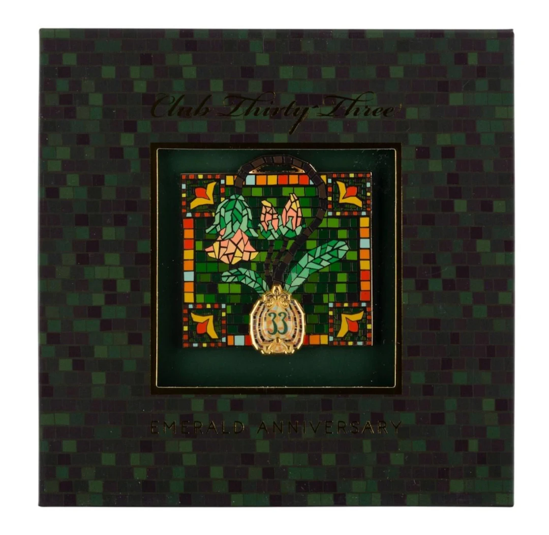 A Club 33 Commemorative Emerald Anniversary Lamp Pin.