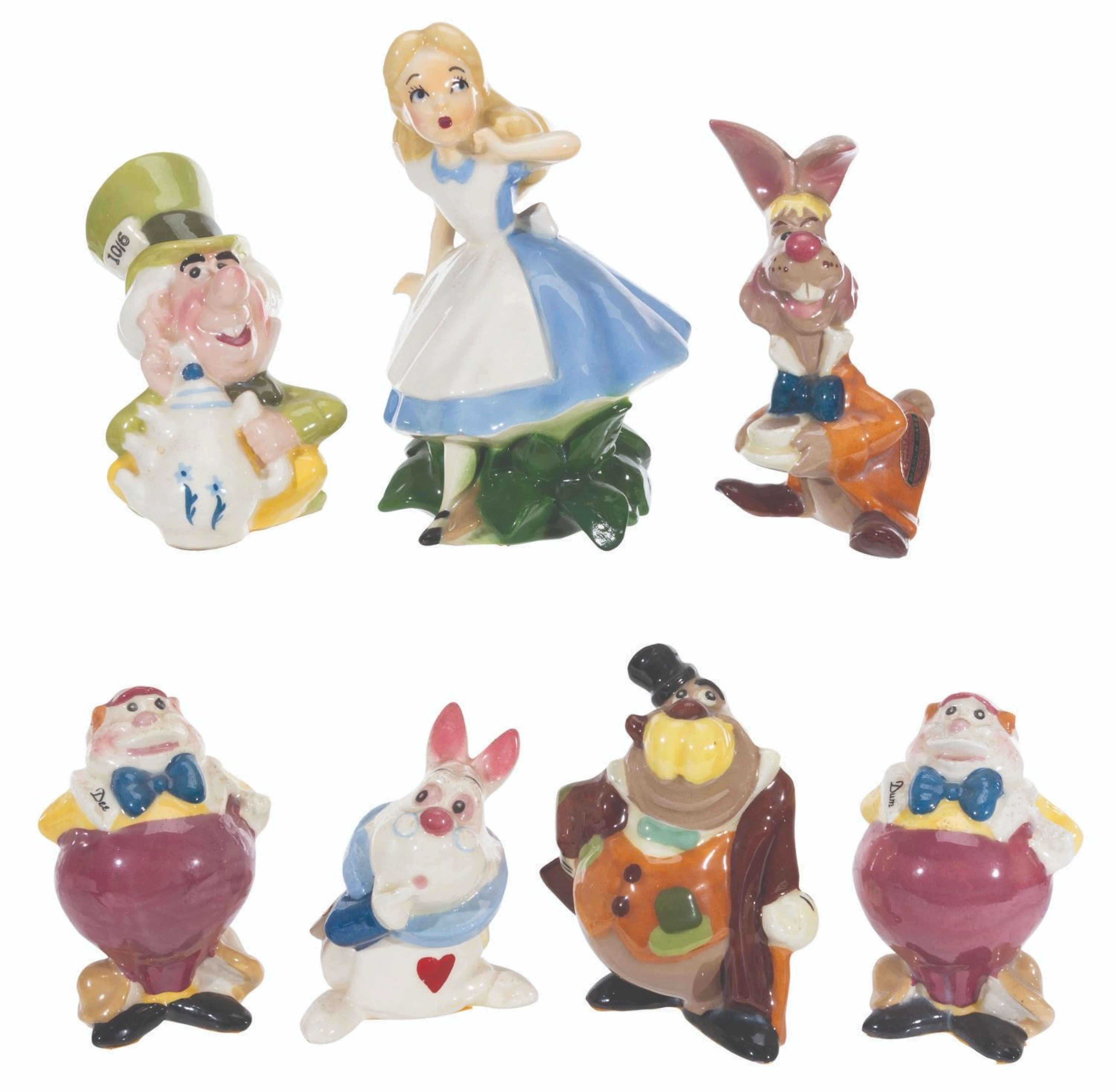 A Set of "Alice in Wonderland" Ceramic Figurines by Evan K. Shaw.
