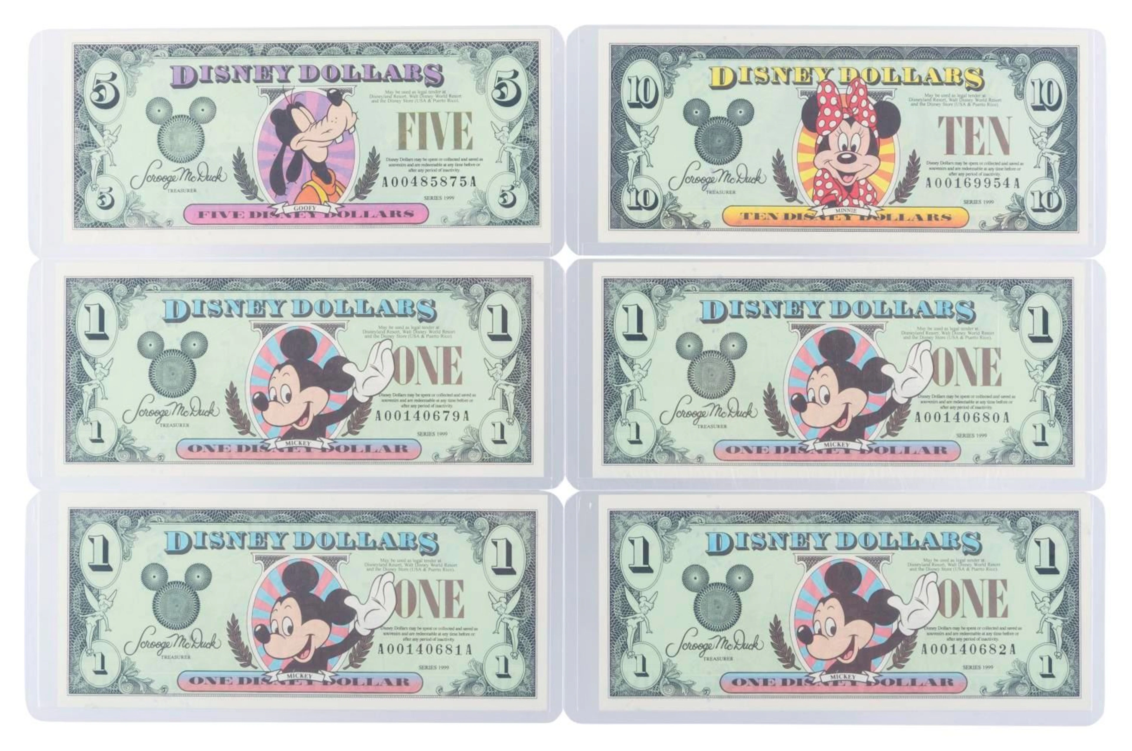 The Disneyland 1999 AA Series $1, $5, and $10 Bills.
