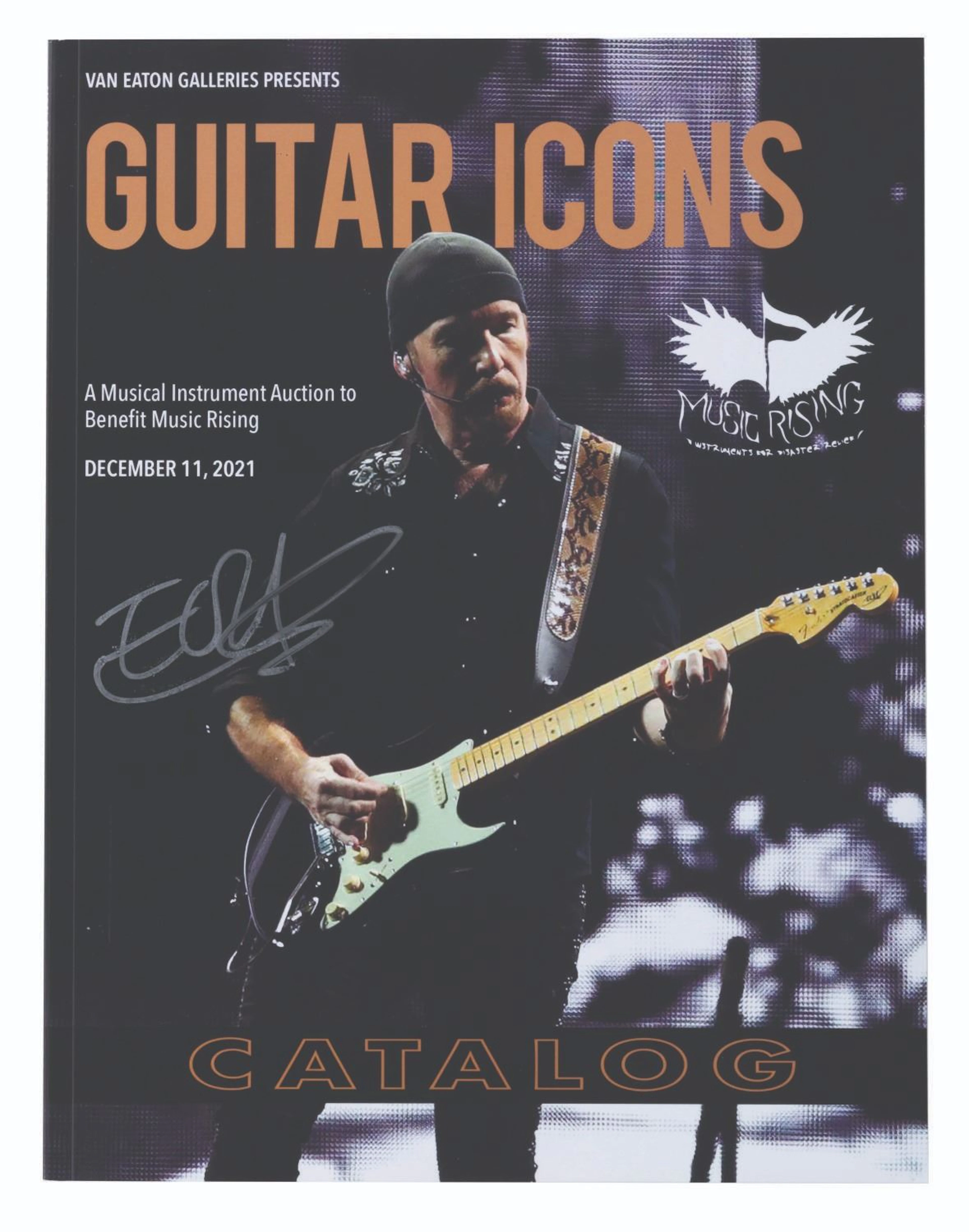 A Van Eaton Galleries Guitar Icons Catalog Signed by The Edge.