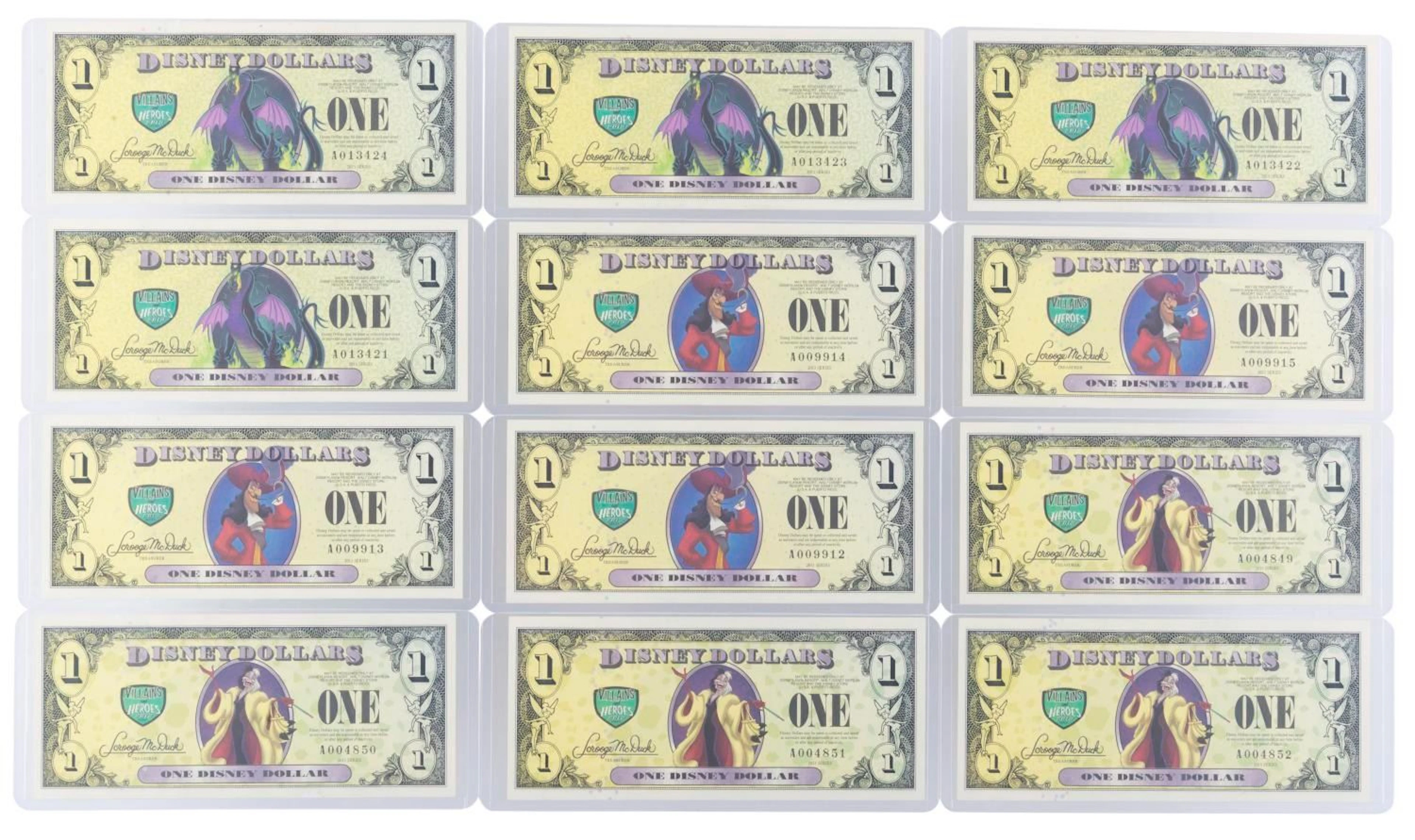 The 2013 Disney Dollars Villains and Heroes Series $1 Bills.