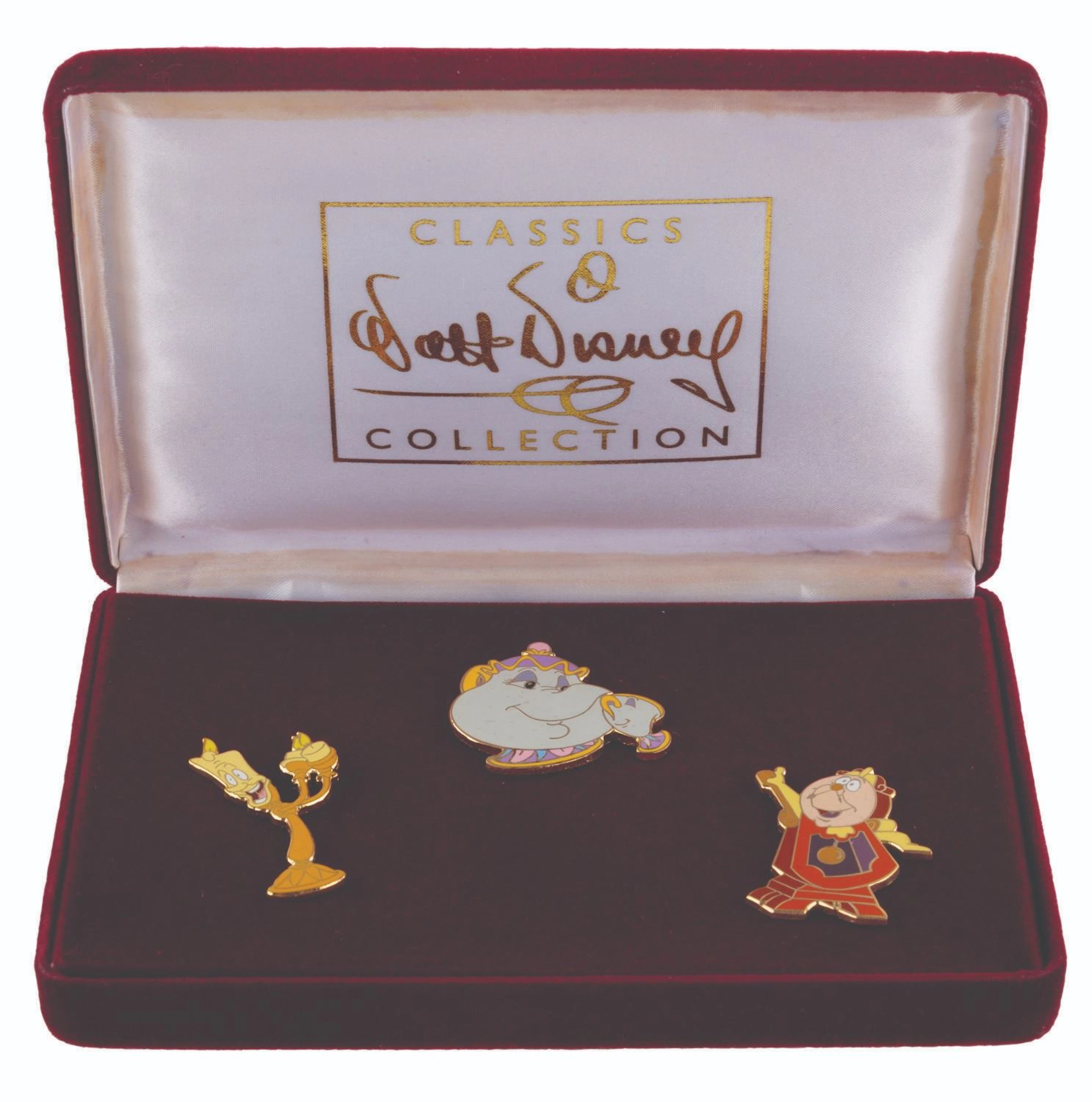 A WDCC"Beauty and the Beast" Pin Set.