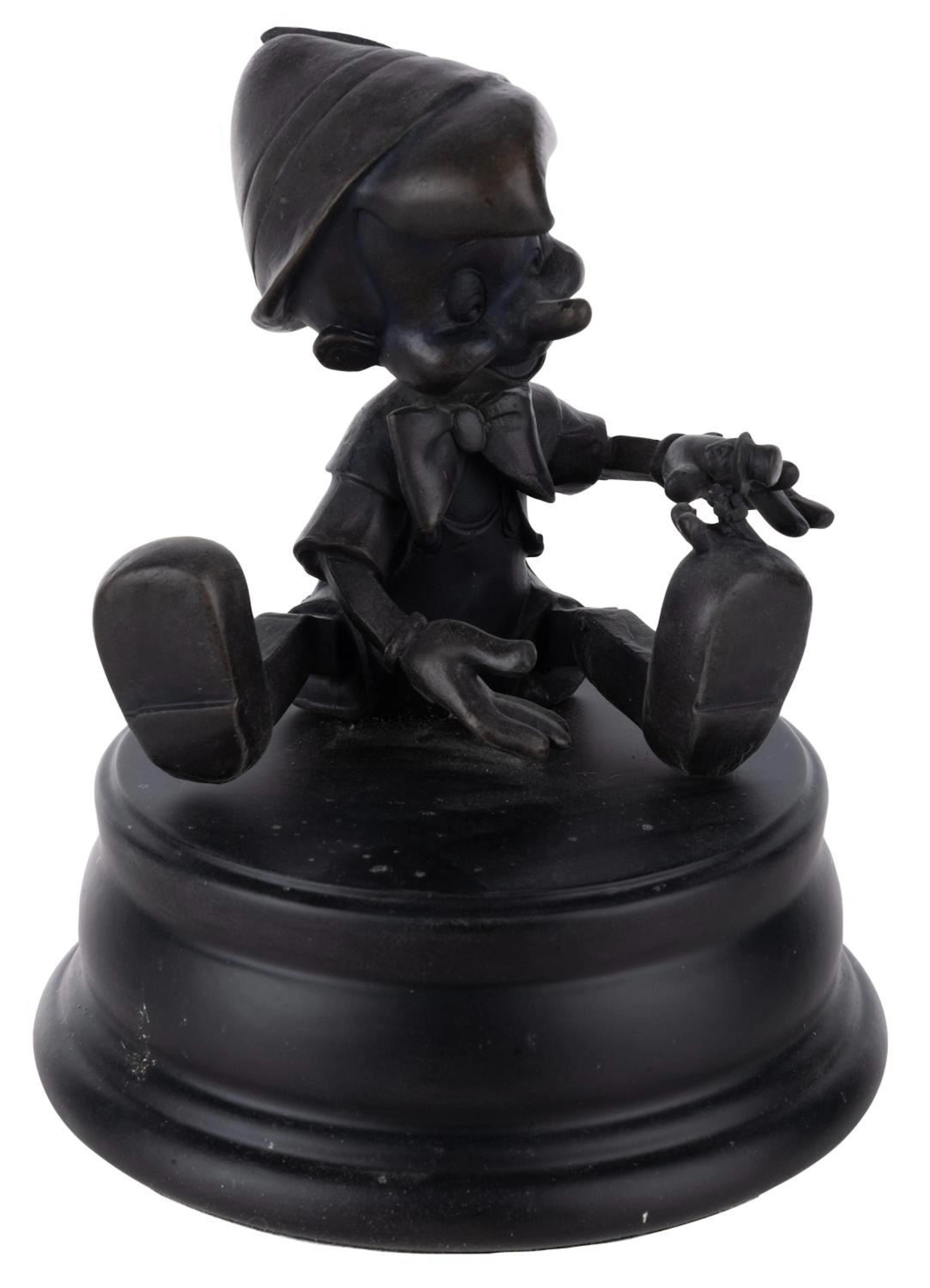 A Disneyland Hub Pinocchio Bronze Collectible.
